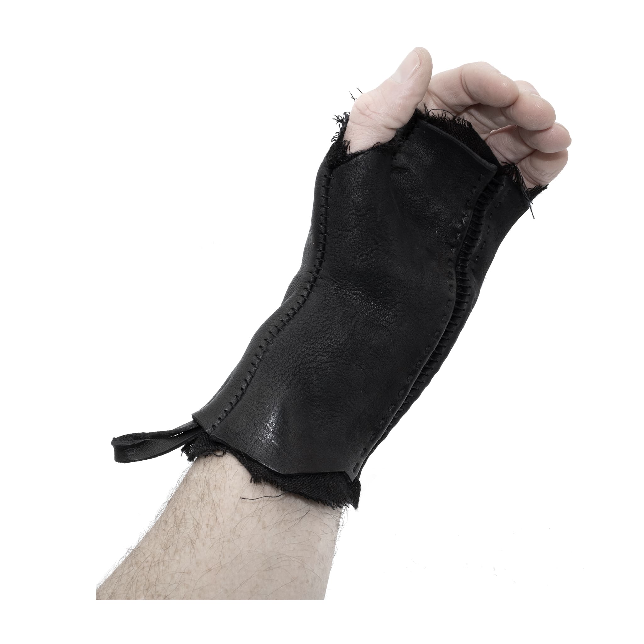 hand stitched over a 35hr period the washed cordovan gloves feature deconstructed open seam panels, hand forged solid .999 sterling silver button and a raw cut stone washed ramie lining. the gloves are available to buy online from avant garde leather studio atelierskn.com