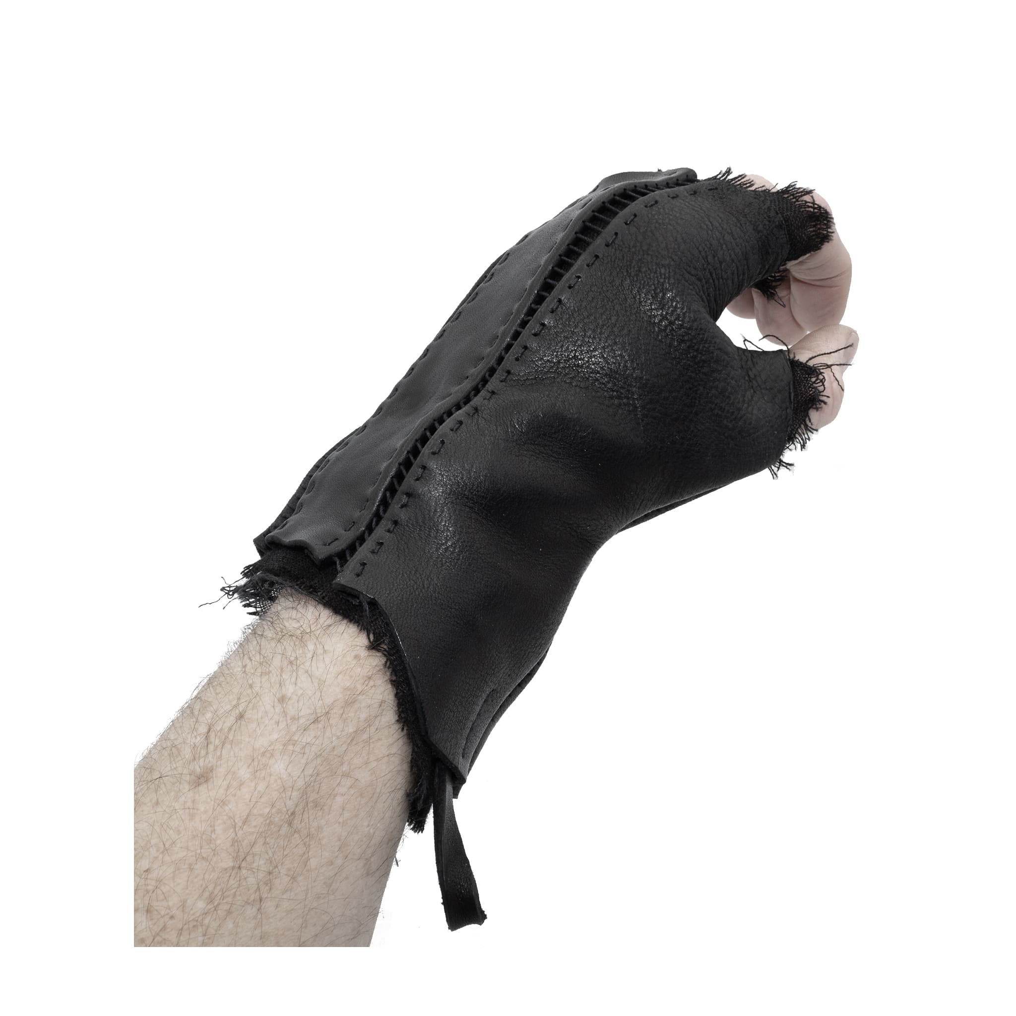 hand stitched over a 35hr period the washed cordovan gloves feature deconstructed open seam panels, hand forged solid .999 sterling silver button and a raw cut stone washed ramie lining. the gloves are available to buy online from avant garde leather studio atelierskn.com