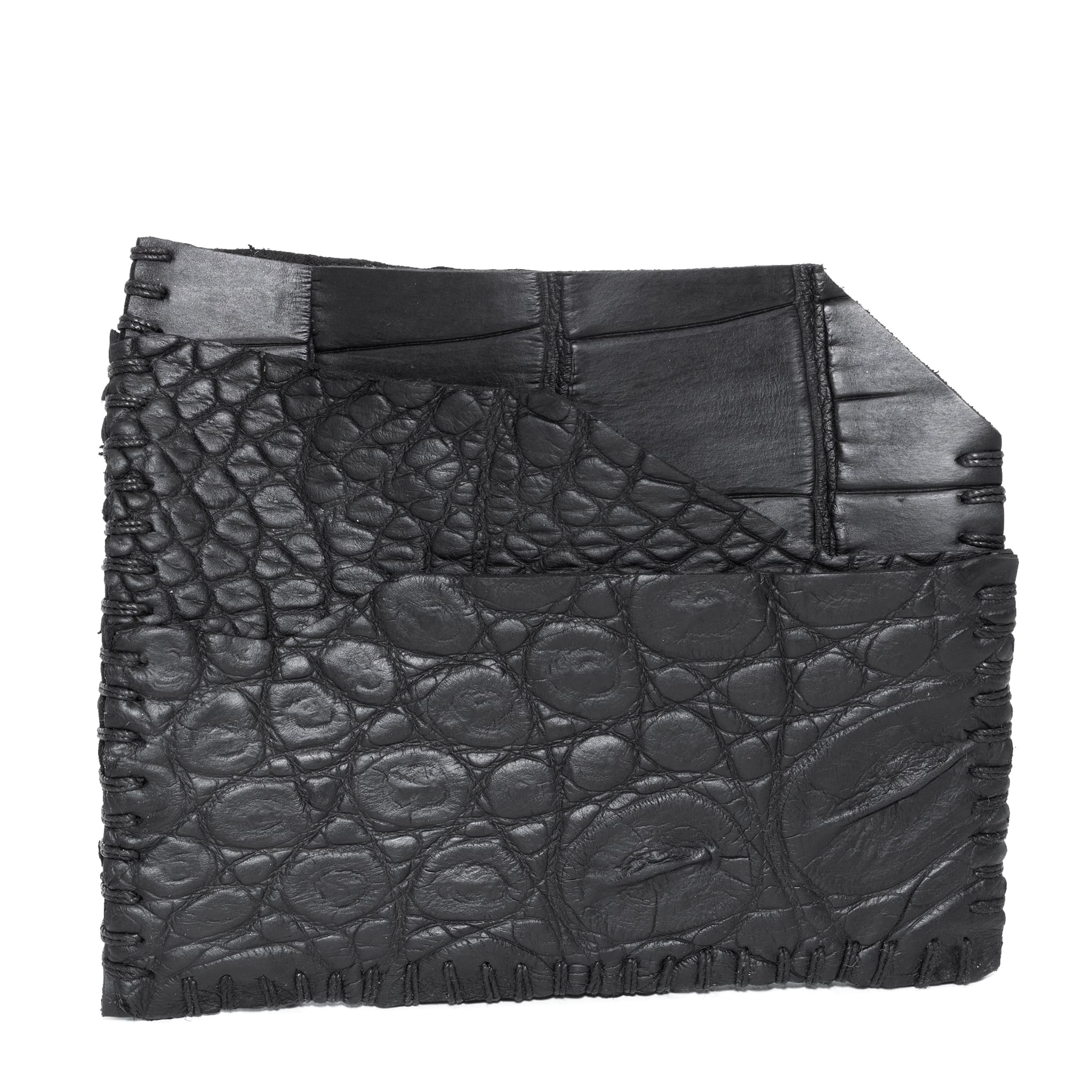 hand stitched over an 8 hour period the genuine crocodile cardholder features multiple card slots, hand stitched overlock sides and an array of unique textures. the cardholder is available to buy online from avant garde leather studio atelierskn.com