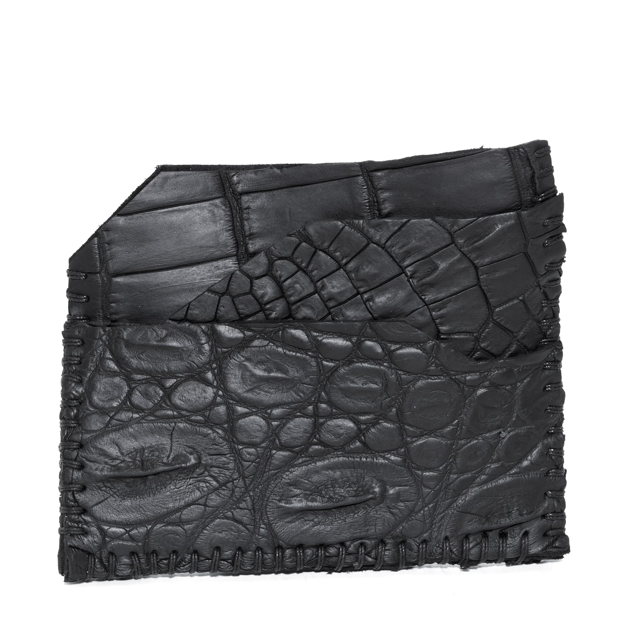 hand stitched over an 8 hour period the genuine crocodile cardholder features multiple card slots, hand stitched overlock sides and an array of unique textures. the cardholder is available to buy online from avant garde leather studio atelierskn.com