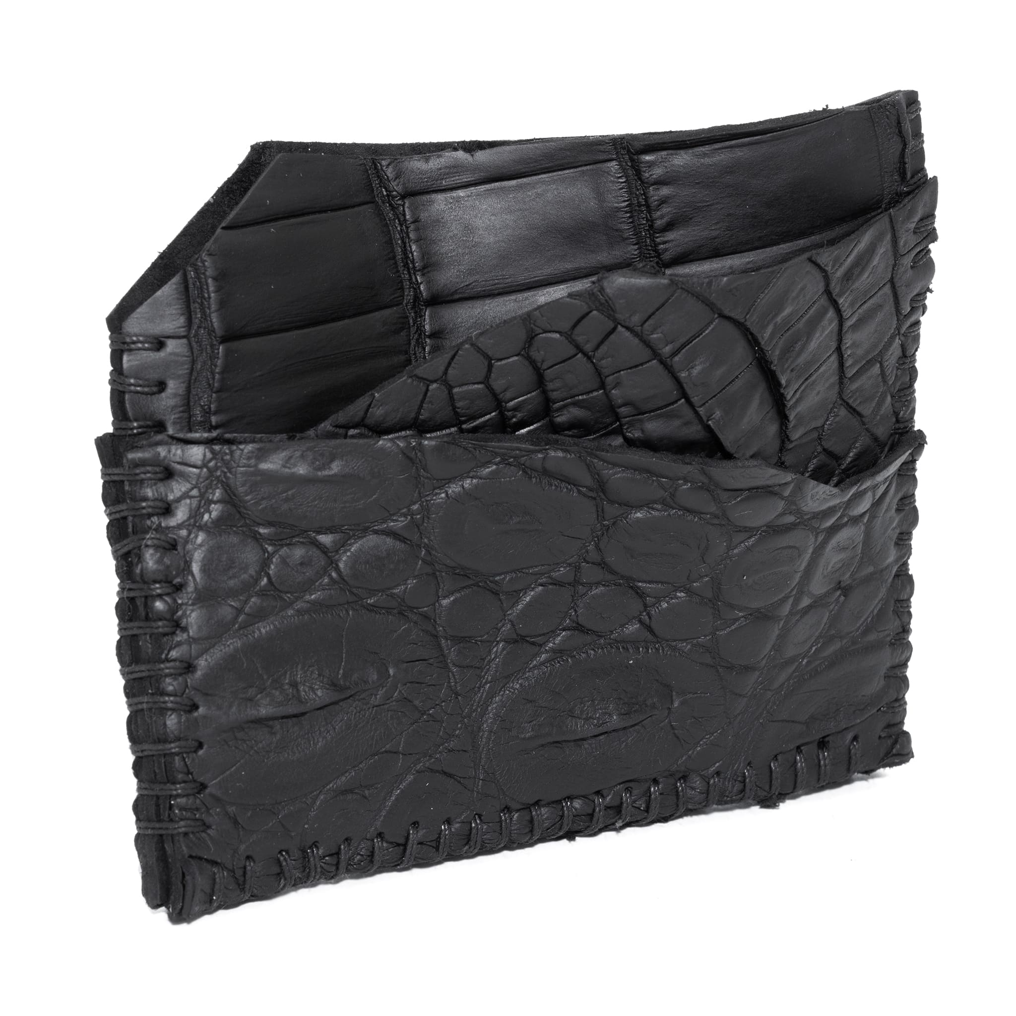 hand stitched over an 8 hour period the genuine crocodile cardholder features multiple card slots, hand stitched overlock sides and an array of unique textures. the cardholder is available to buy online from avant garde leather studio atelierskn.com