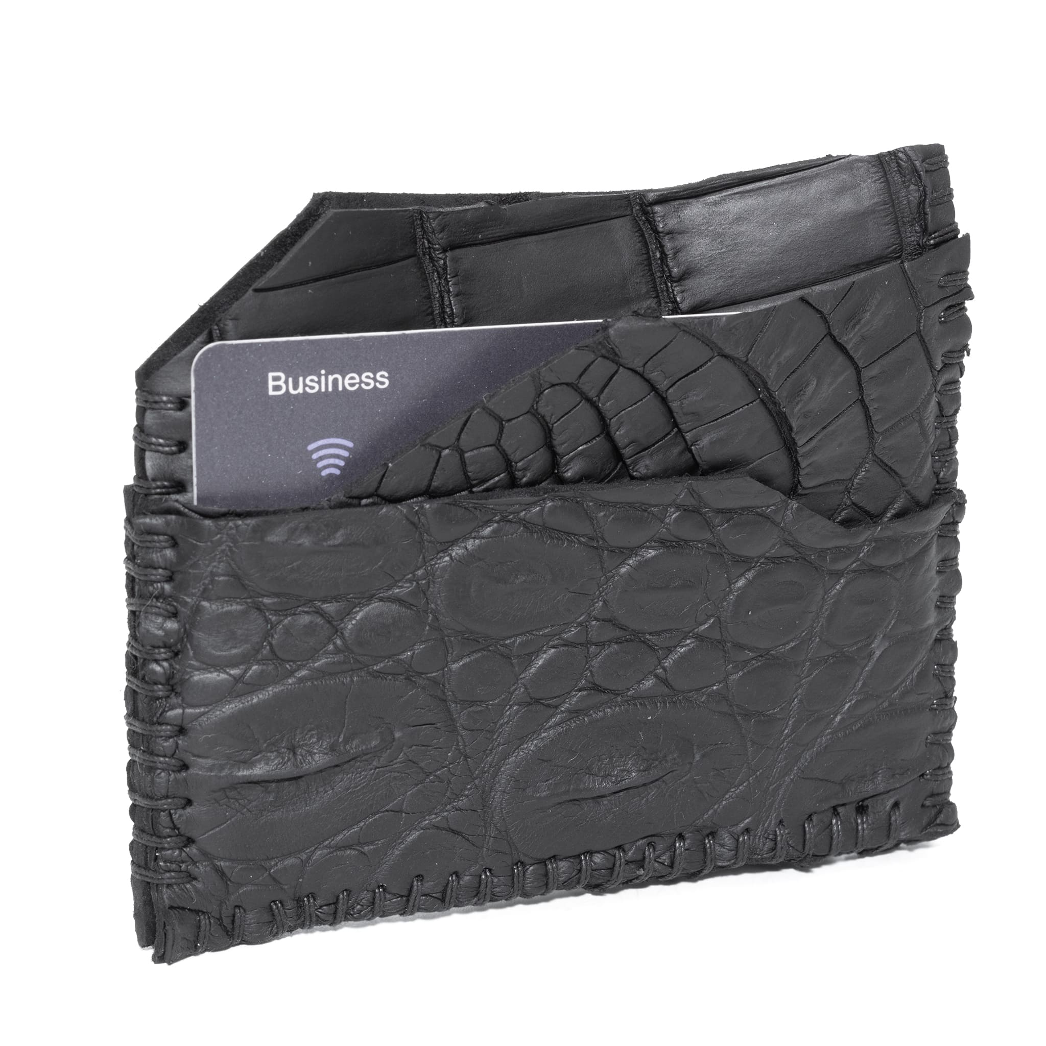 hand stitched over an 8 hour period the genuine crocodile cardholder features multiple card slots, hand stitched overlock sides and an array of unique textures. the cardholder is available to buy online from avant garde leather studio atelierskn.com