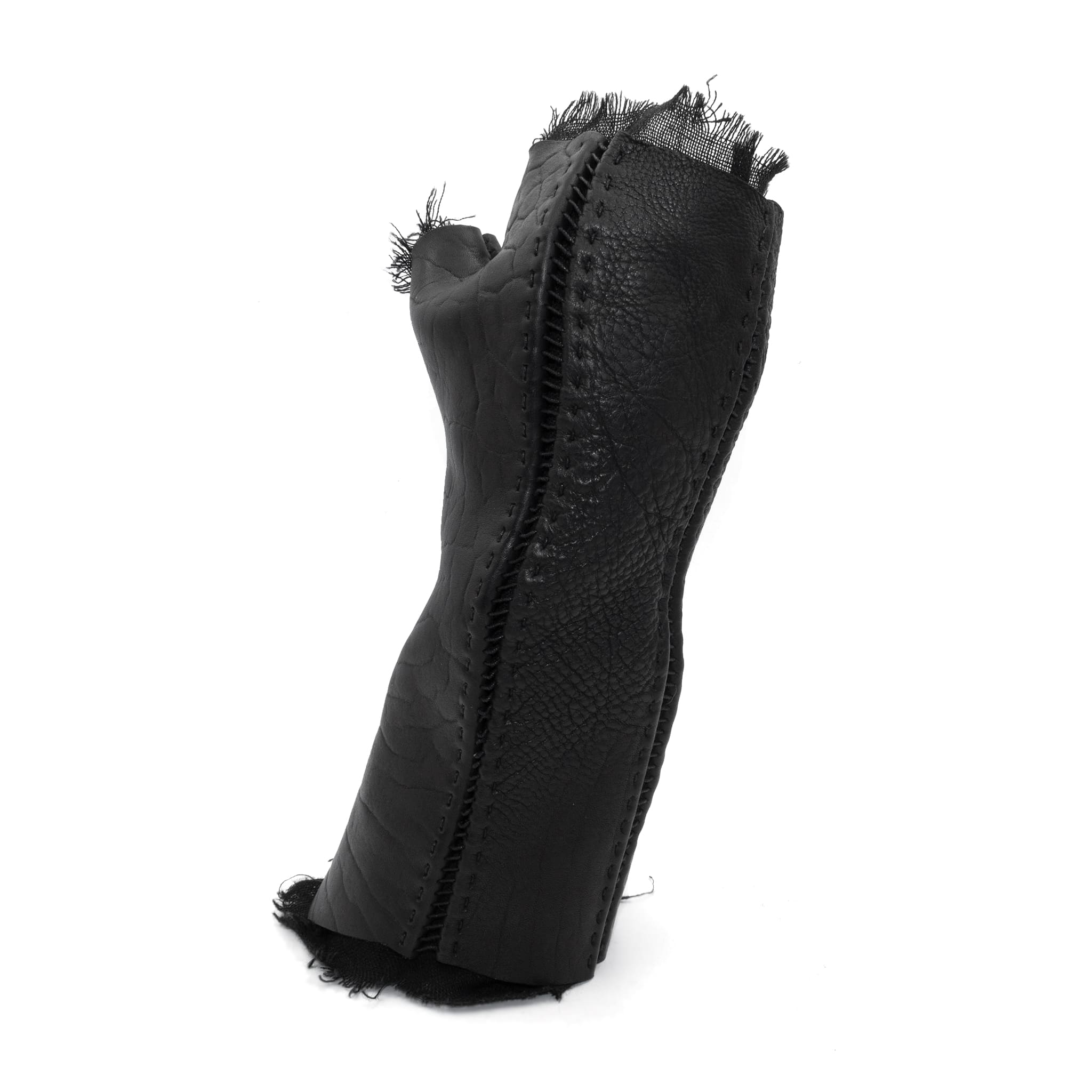 hand stitched over a 40hr period the washed culatta leather gloves feature deconstructed open seam panels, and a stone washed ramie lining. wet moulded on the body over an 8 hour period for a sculptured aesthetic. the gloves are available to buy online from avant garde leather studio atelierskn.com