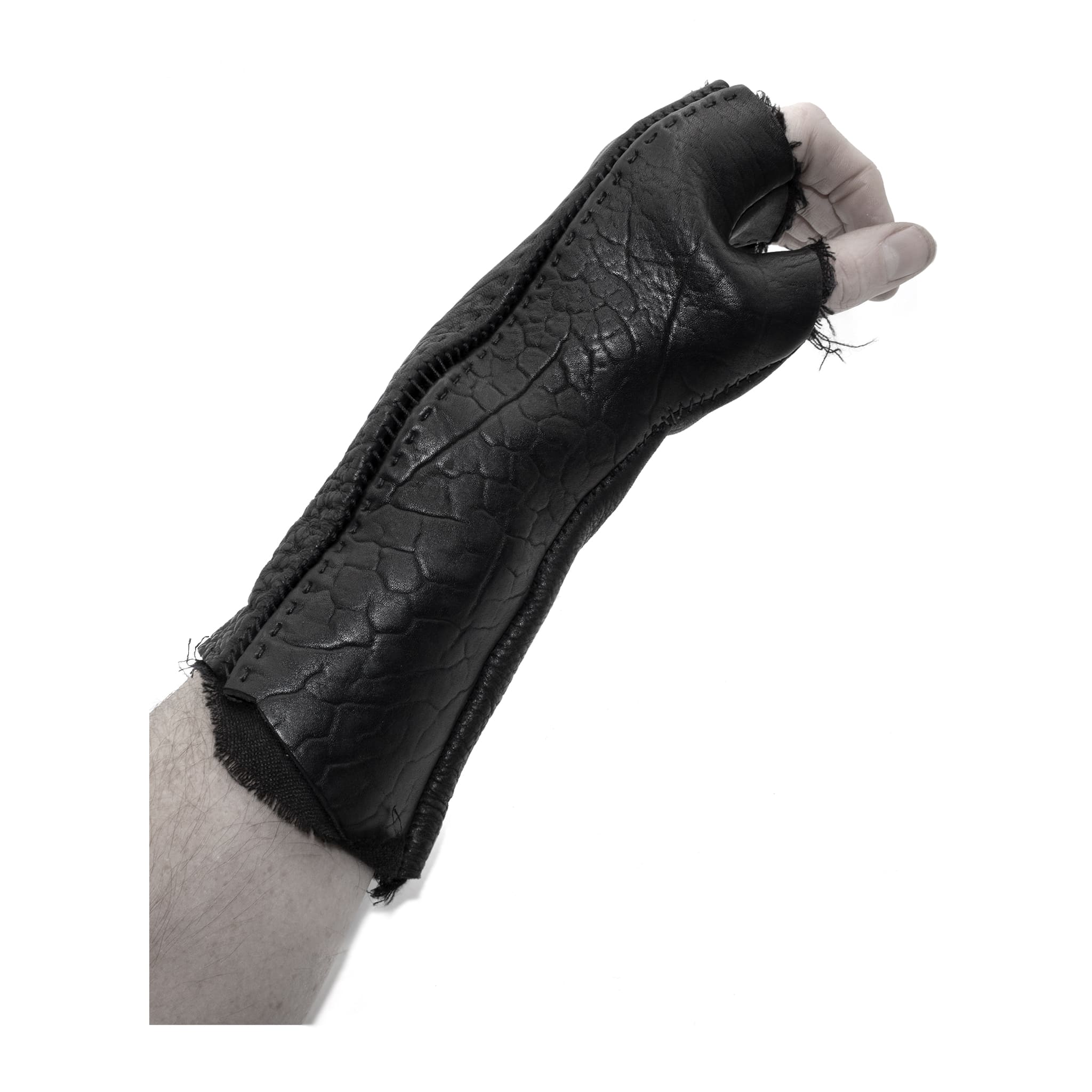 hand stitched over a 40hr period the washed culatta leather gloves feature deconstructed open seam panels, and a stone washed ramie lining. wet moulded on the body over an 8 hour period for a sculptured aesthetic. the gloves are available to buy online from avant garde leather studio atelierskn.com
