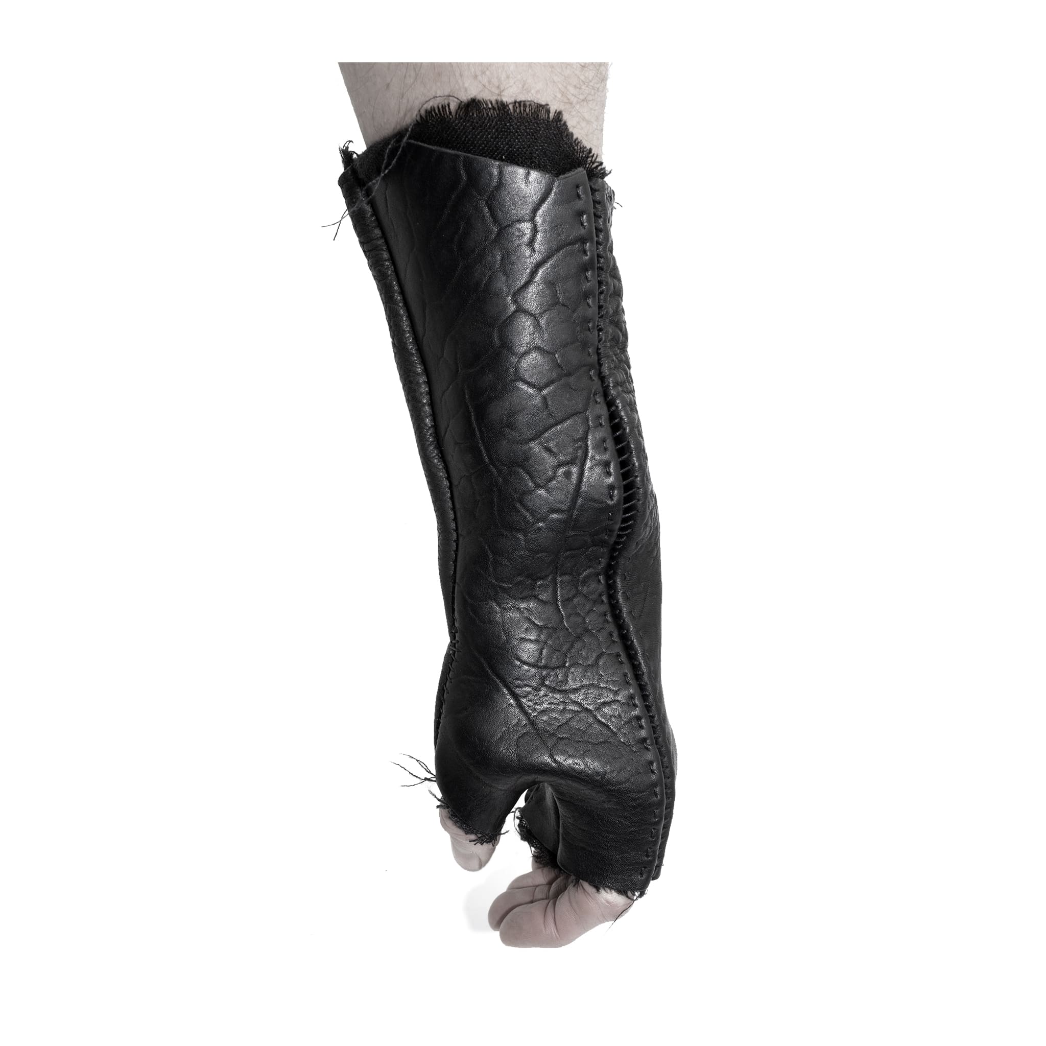 hand stitched over a 40hr period the washed culatta leather gloves feature deconstructed open seam panels, and a stone washed ramie lining. wet moulded on the body over an 8 hour period for a sculptured aesthetic. the gloves are available to buy online from avant garde leather studio atelierskn.com