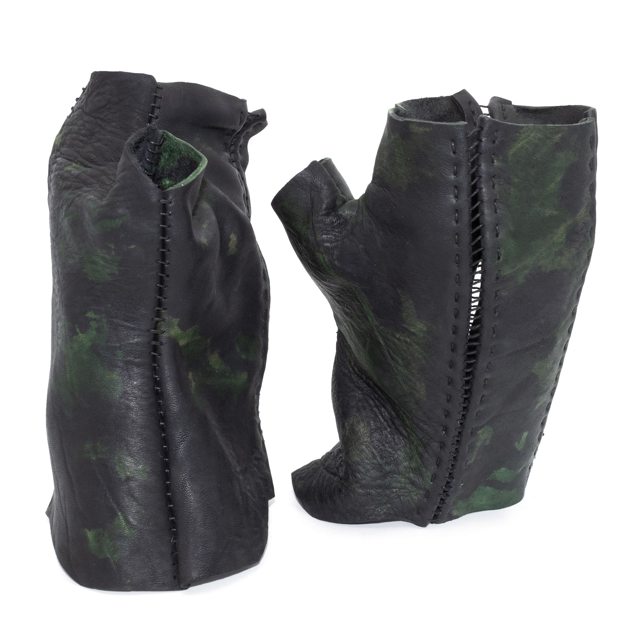 hand stitched over a 35hr period the washed horse culatta leather gloves feature deconstructed open seam panels, and a multiple layer absinthe dye treatment. the gloves are available to buy online from avant garde leather studio atelierskn.com