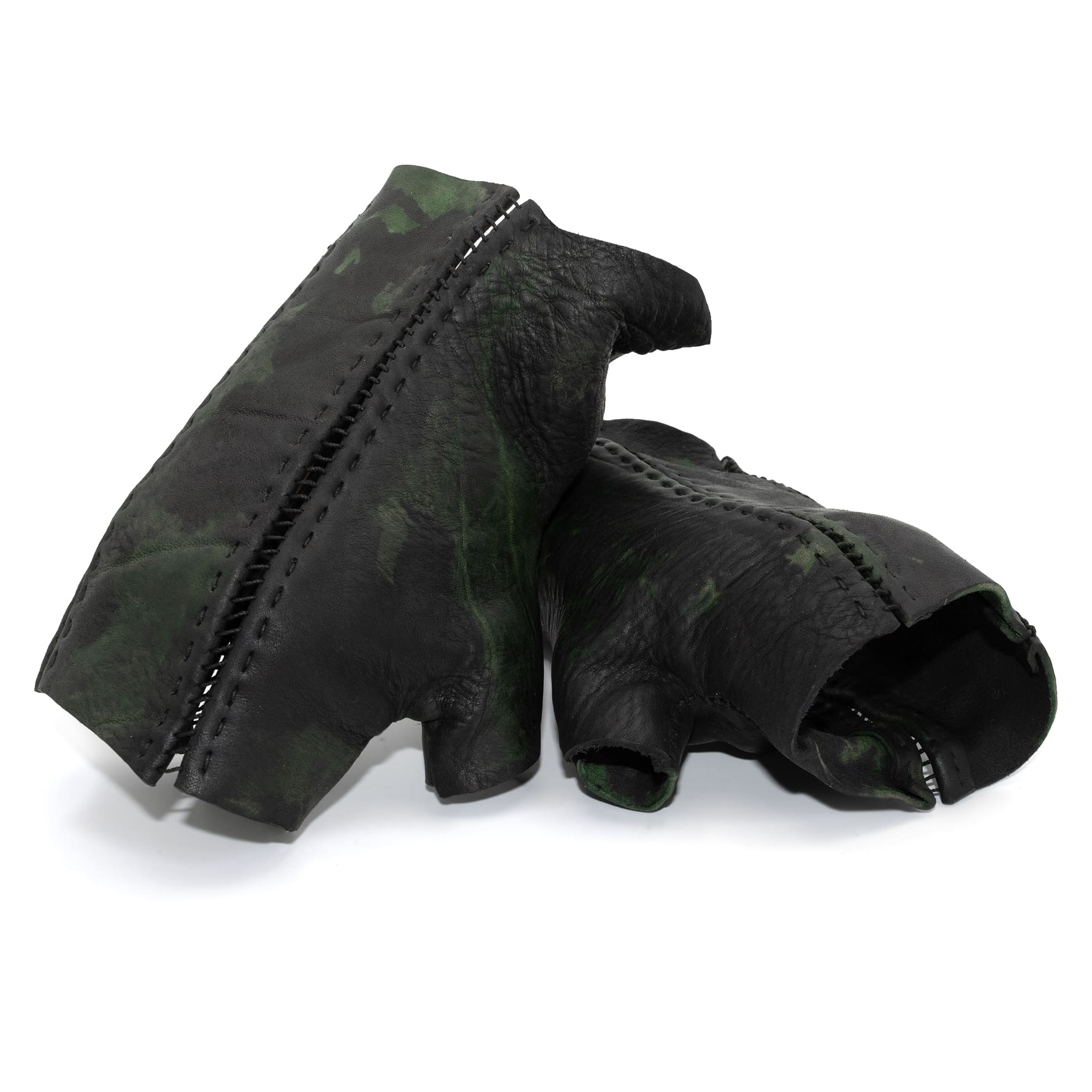 hand stitched over a 35hr period the washed horse culatta leather gloves feature deconstructed open seam panels, and a multiple layer absinthe dye treatment. the gloves are available to buy online from avant garde leather studio atelierskn.com