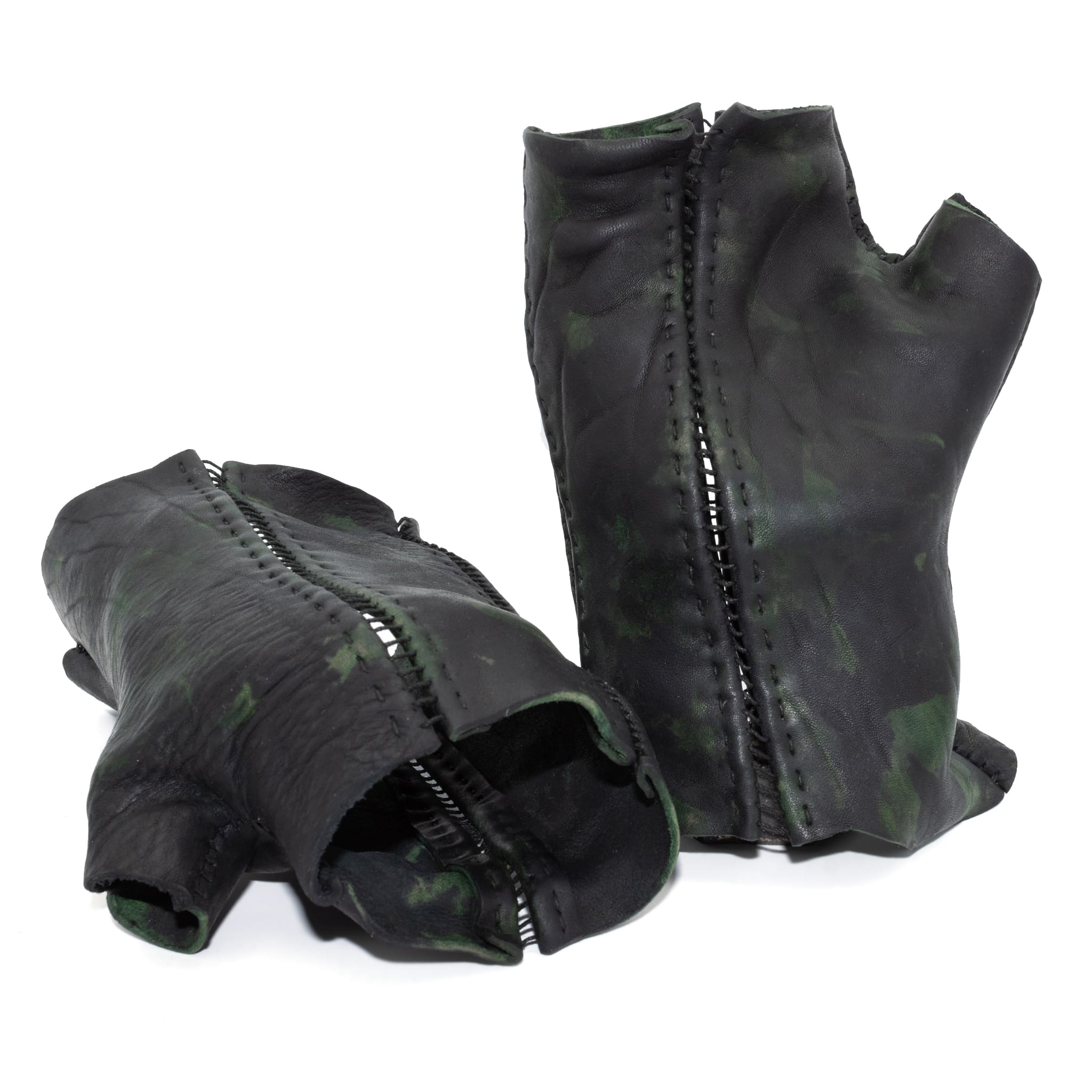 hand stitched over a 35hr period the washed horse culatta leather gloves feature deconstructed open seam panels, and a multiple layer absinthe dye treatment. the gloves are available to buy online from avant garde leather studio atelierskn.com