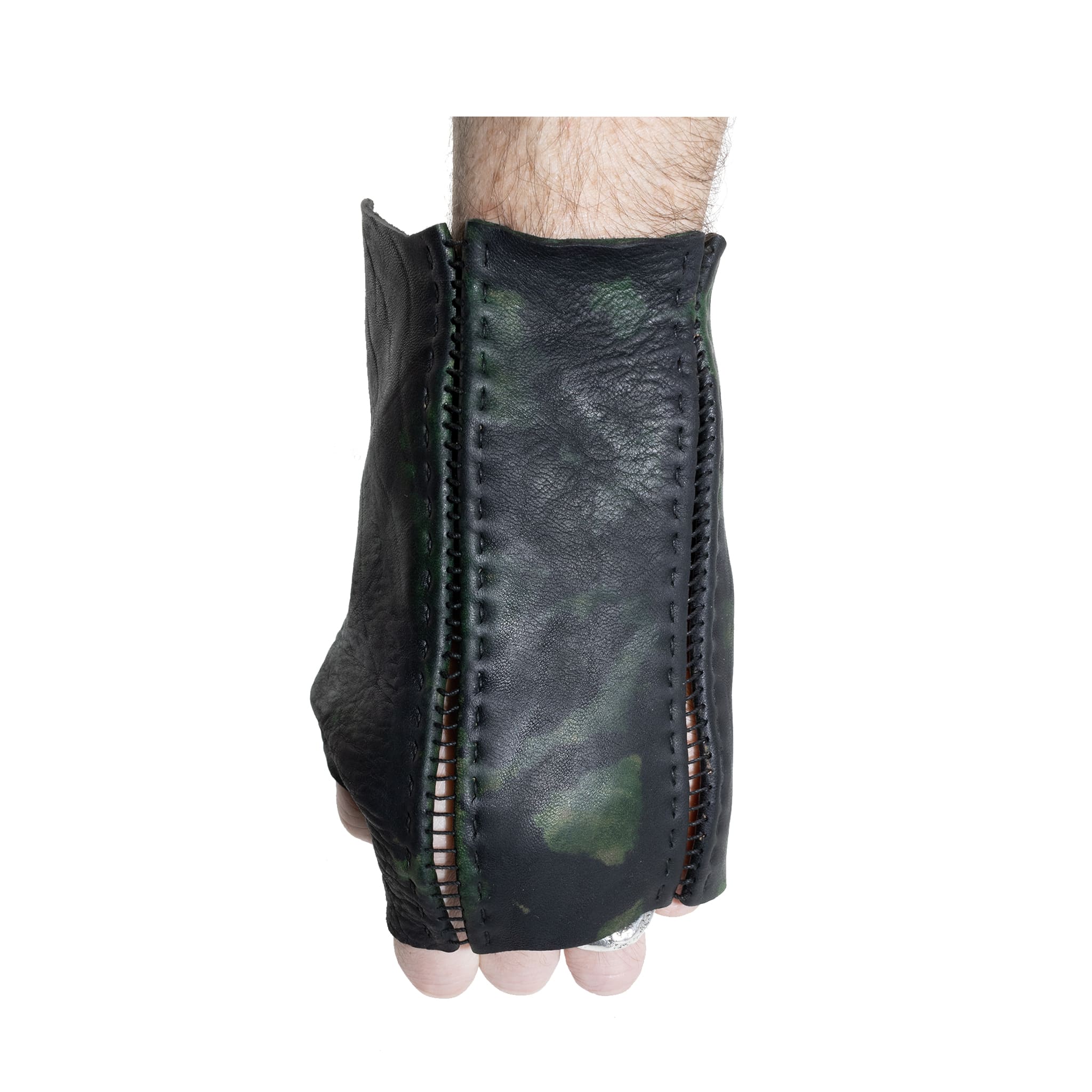 hand stitched over a 35hr period the washed horse culatta leather gloves feature deconstructed open seam panels, and a multiple layer absinthe dye treatment. the gloves are available to buy online from avant garde leather studio atelierskn.com