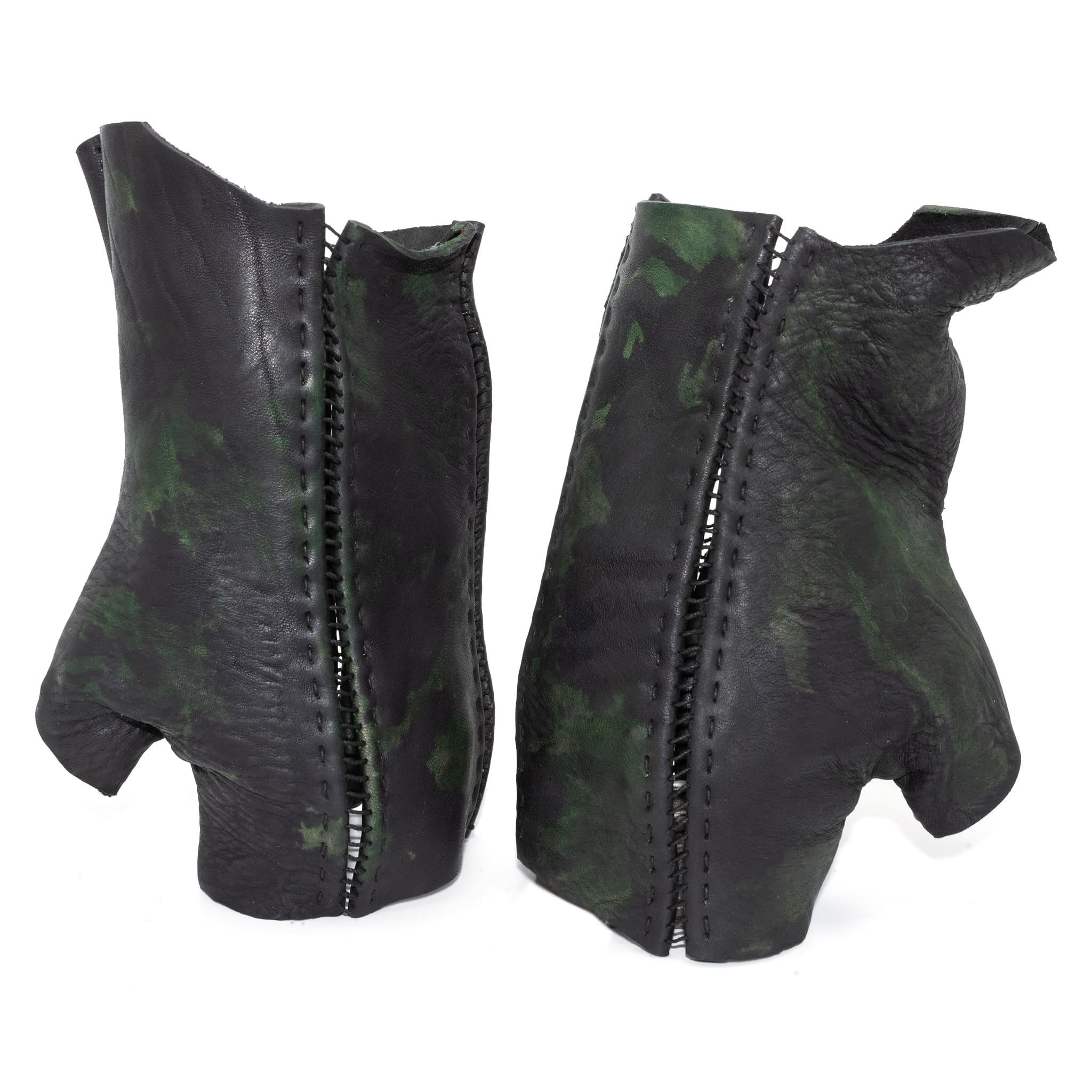 hand stitched over a 35hr period the washed horse culatta leather gloves feature deconstructed open seam panels, and a multiple layer absinthe dye treatment. the gloves are available to buy online from avant garde leather studio atelierskn.com