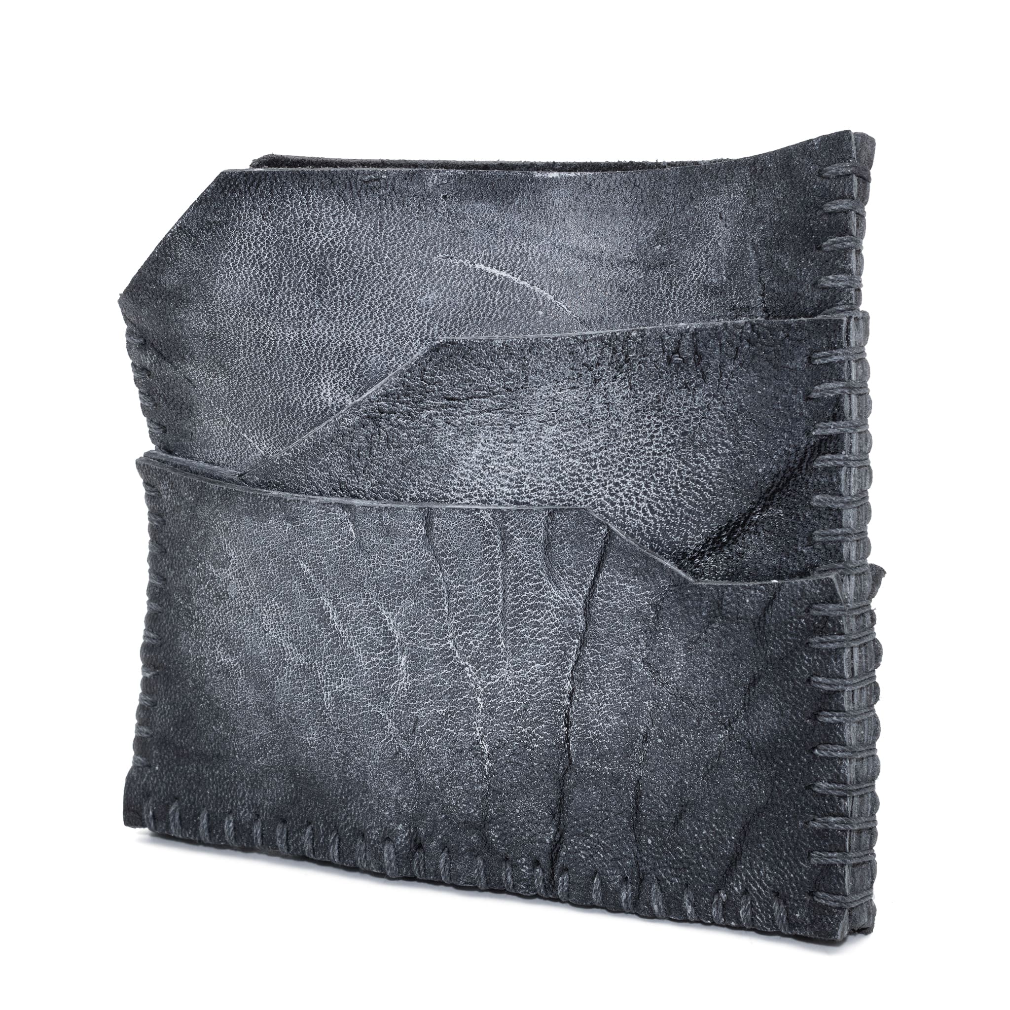 hand stitched over an 8hr period the washed culatta cardholder features multiple card slots, hand stitched overlock sides and a pigmented wax finish. the cardholder is available to buy online from avant garde leather studio atelierskn.com