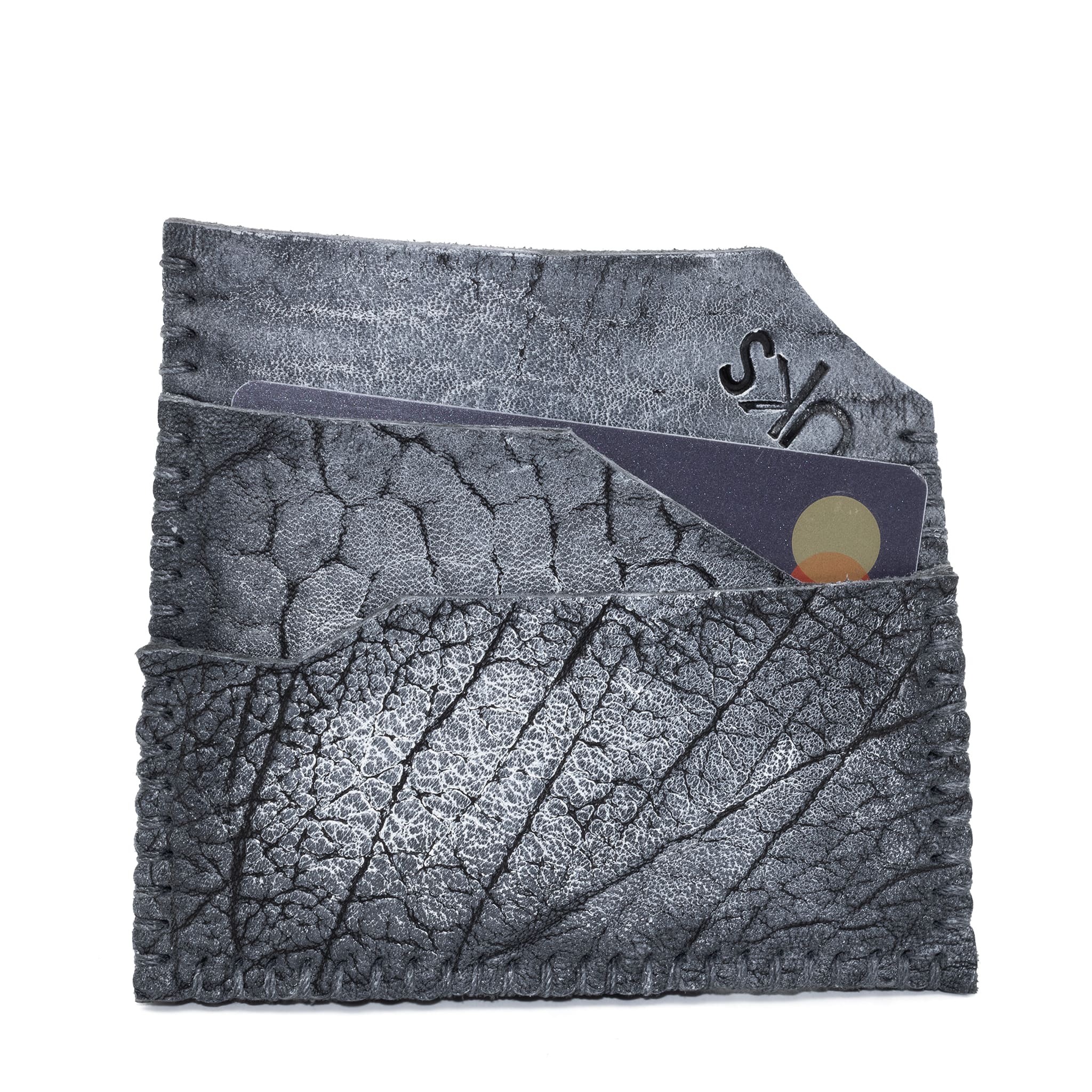 hand stitched over an 8hr period the washed culatta cardholder features multiple card slots, hand stitched overlock sides and a pigmented wax finish. the cardholder is available to buy online from avant garde leather studio atelierskn.com
