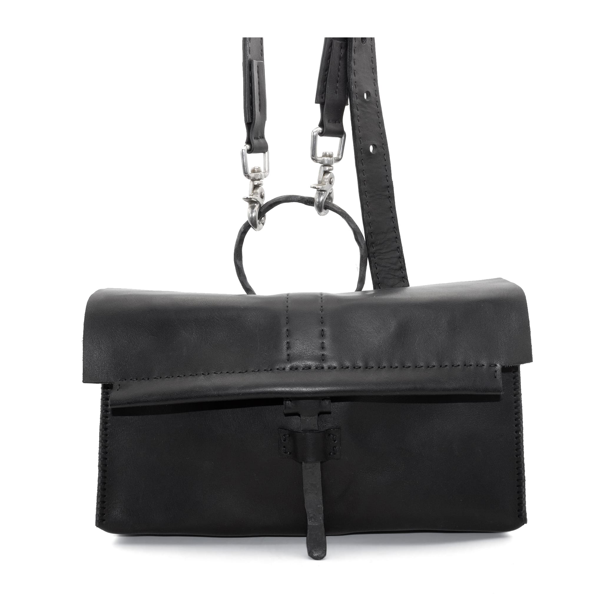 meticulously hand sewn, the washed horse leather landscape shoulder bag is crafted from a single piece pattern and features a minimal silhouette, an object dye treatment, tonal linen stitching and hand forged iron hardware. a large iron ring acts as a handle and an anchor for the detachable strap. the cross body bag is available to buy online from avant garde designer atelierskn.com