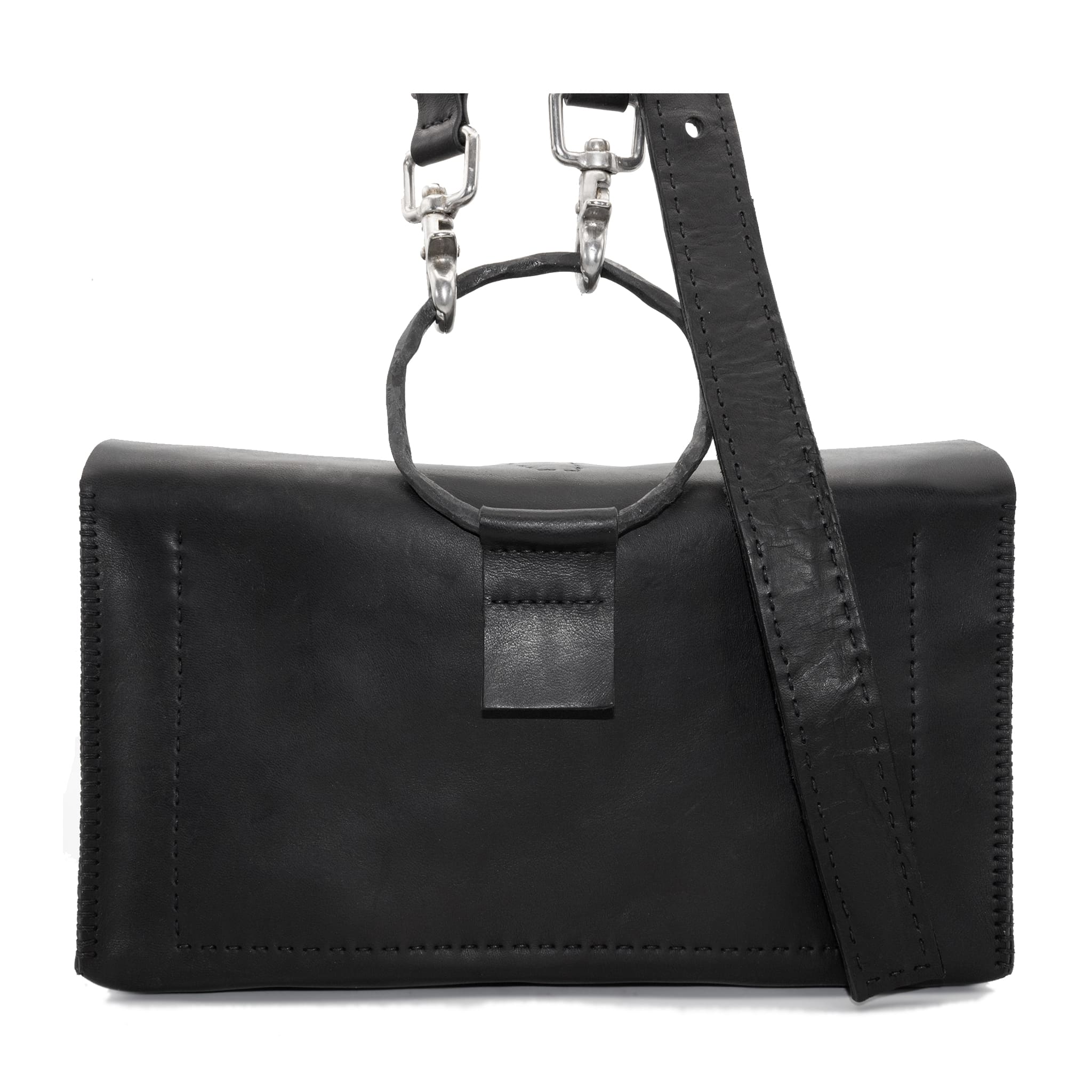 meticulously hand sewn, the washed horse leather landscape shoulder bag is crafted from a single piece pattern and features a minimal silhouette, an object dye treatment, tonal linen stitching and hand forged iron hardware. a large iron ring acts as a handle and an anchor for the detachable strap. the cross body bag is available to buy online from avant garde designer atelierskn.com