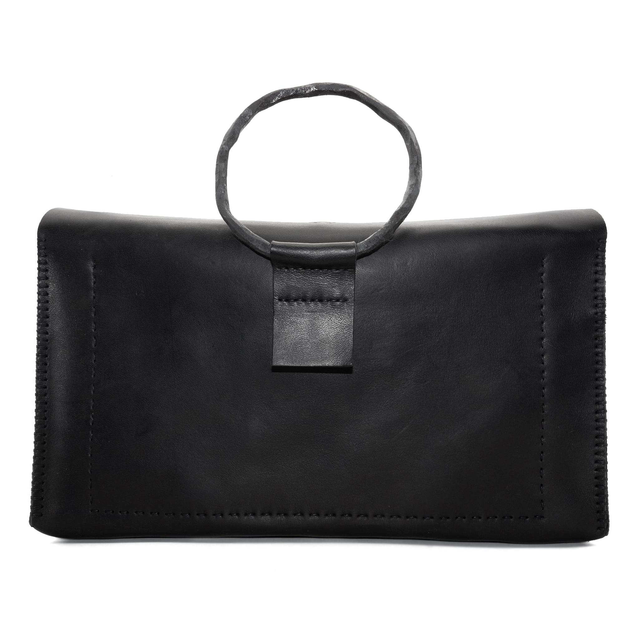 meticulously hand sewn, the washed horse leather landscape shoulder bag is crafted from a single piece pattern and features a minimal silhouette, an object dye treatment, tonal linen stitching and hand forged iron hardware. a large iron ring acts as a handle and an anchor for the detachable strap. the cross body bag is available to buy online from avant garde designer atelierskn.com