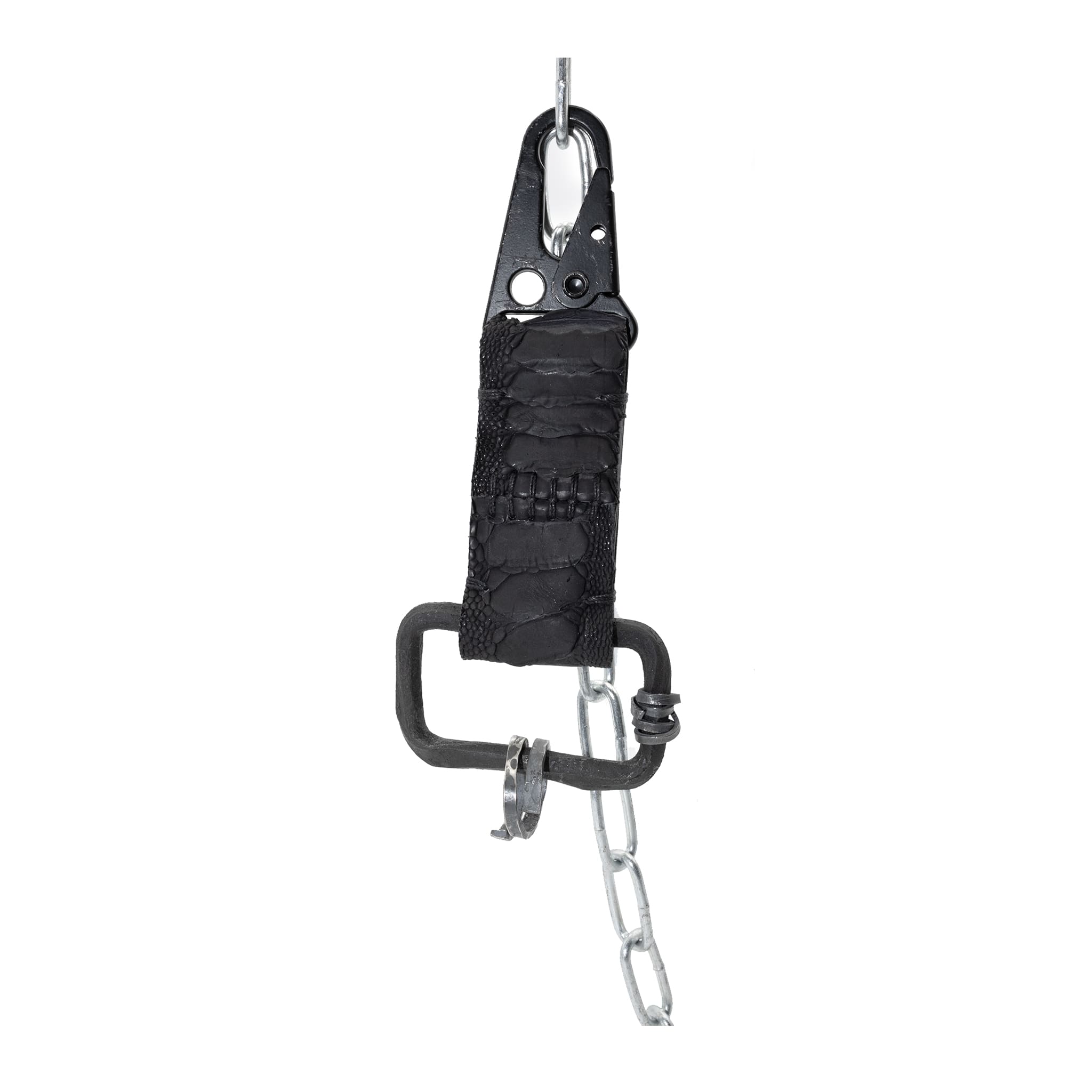 the hand sewn ostrich leather keychain features a flat matte black dye treatment and a distressed military sling clip. a hand forged black iron ring holds the oxidised .925 silver key ring. Buy online from avant garde leather studio atelier skn.