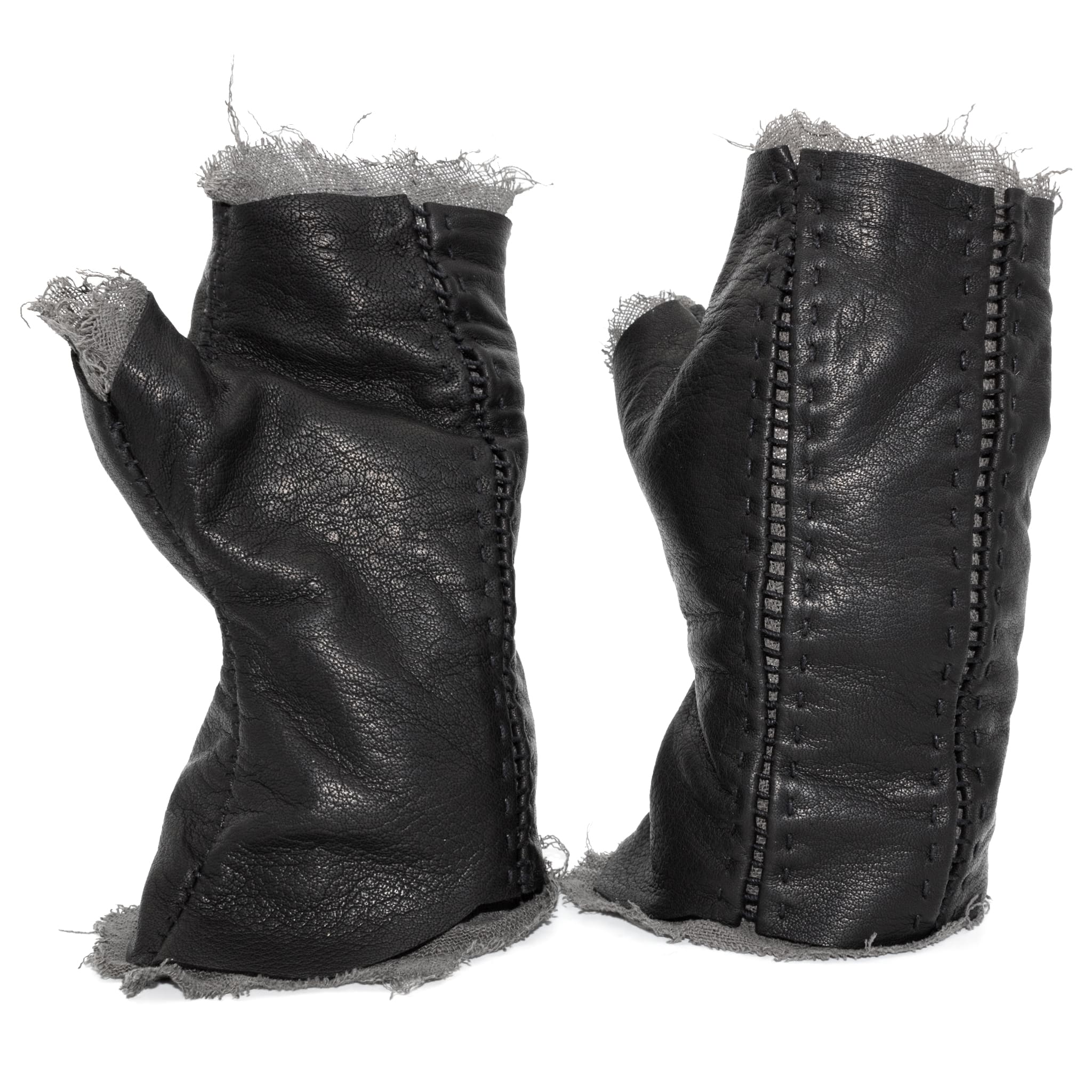 hand stitched over a 35hr period the washed kangaroo leather gloves feature deconstructed open seam panels, and an object dyed raw silk floating lining. the gloves are available to buy online from avant garde leather studio atelierskn.com