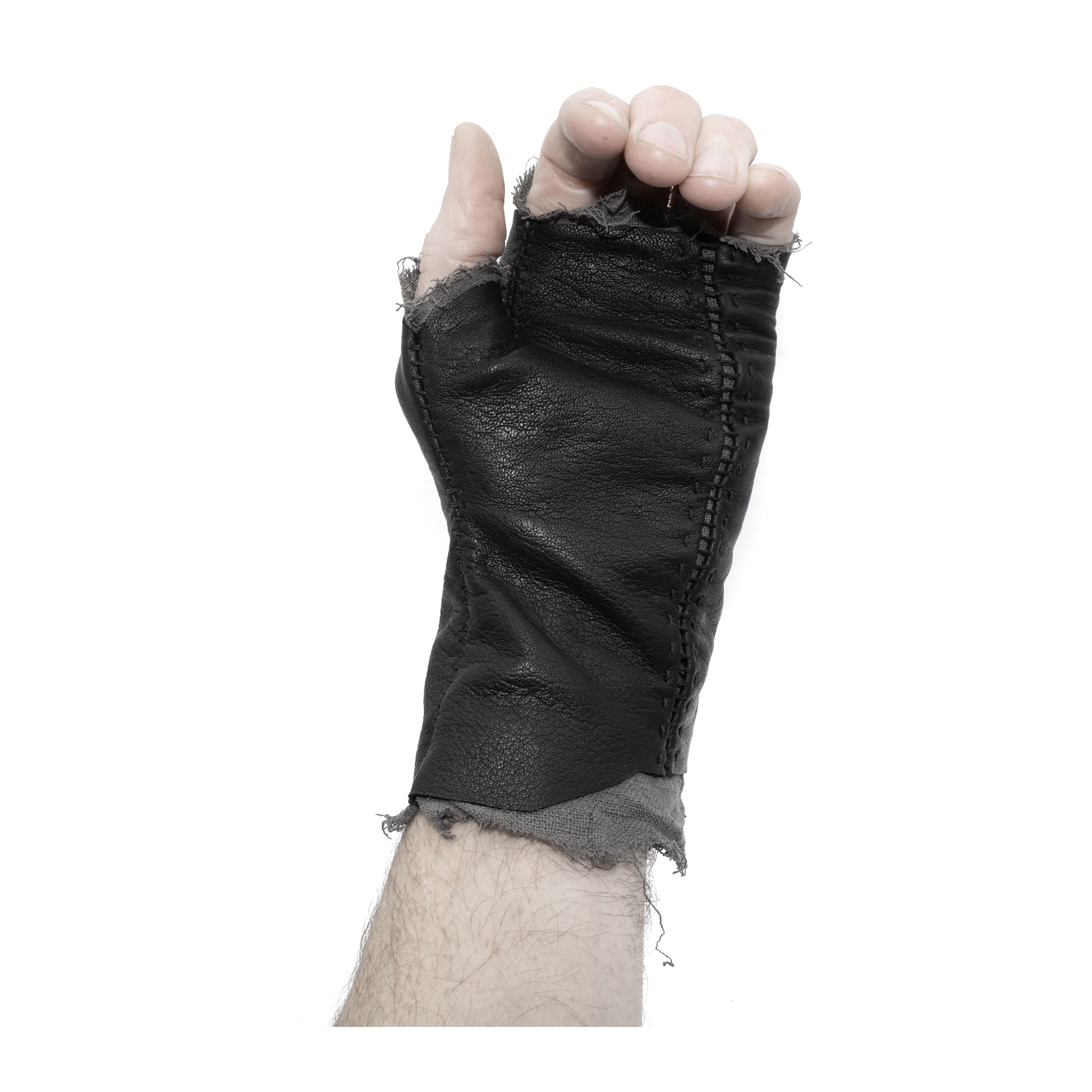 hand stitched over a 35hr period the washed kangaroo leather gloves feature deconstructed open seam panels, and an object dyed raw silk floating lining. the gloves are available to buy online from avant garde leather studio atelierskn.com