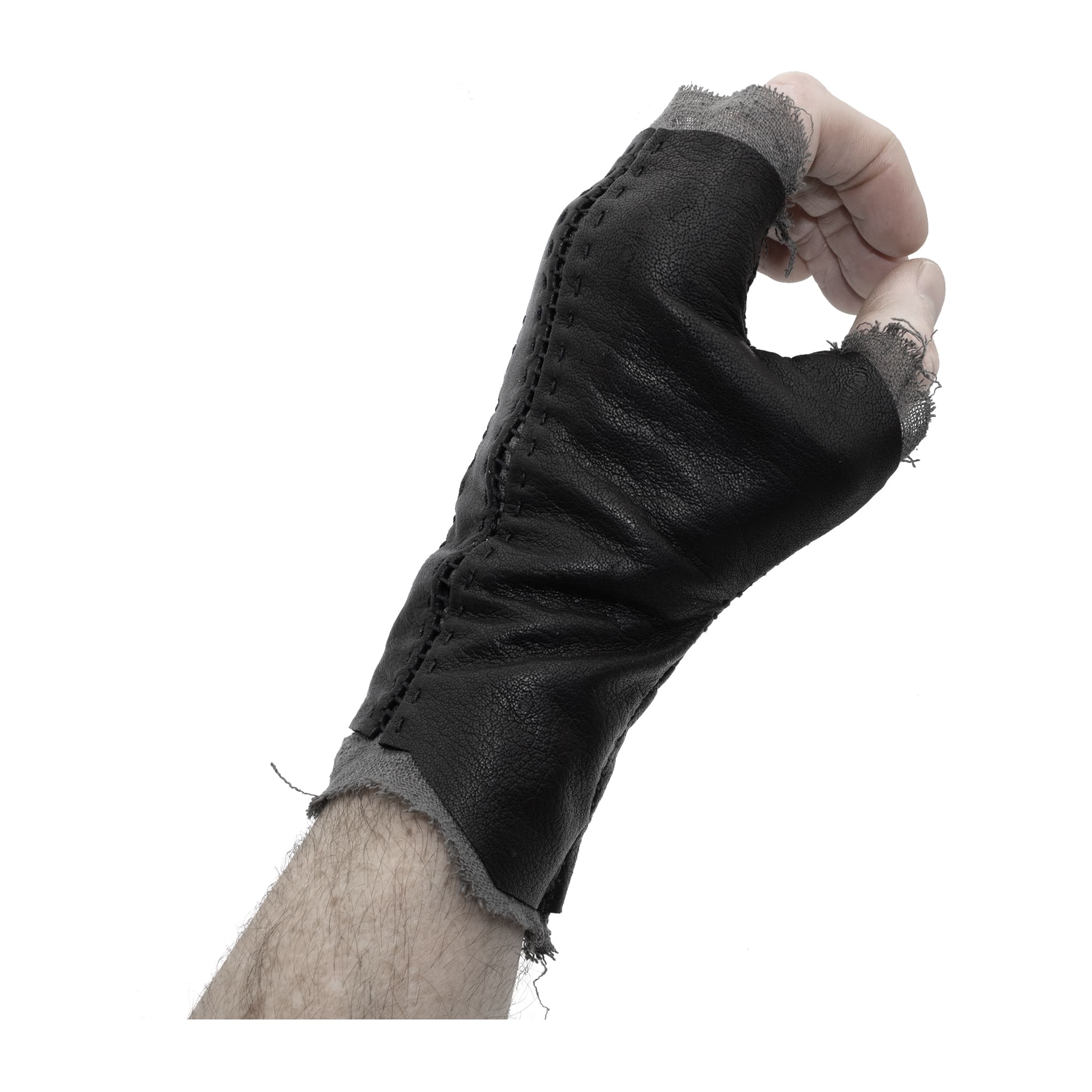 hand stitched over a 35hr period the washed kangaroo leather gloves feature deconstructed open seam panels, and an object dyed raw silk floating lining. the gloves are available to buy online from avant garde leather studio atelierskn.com