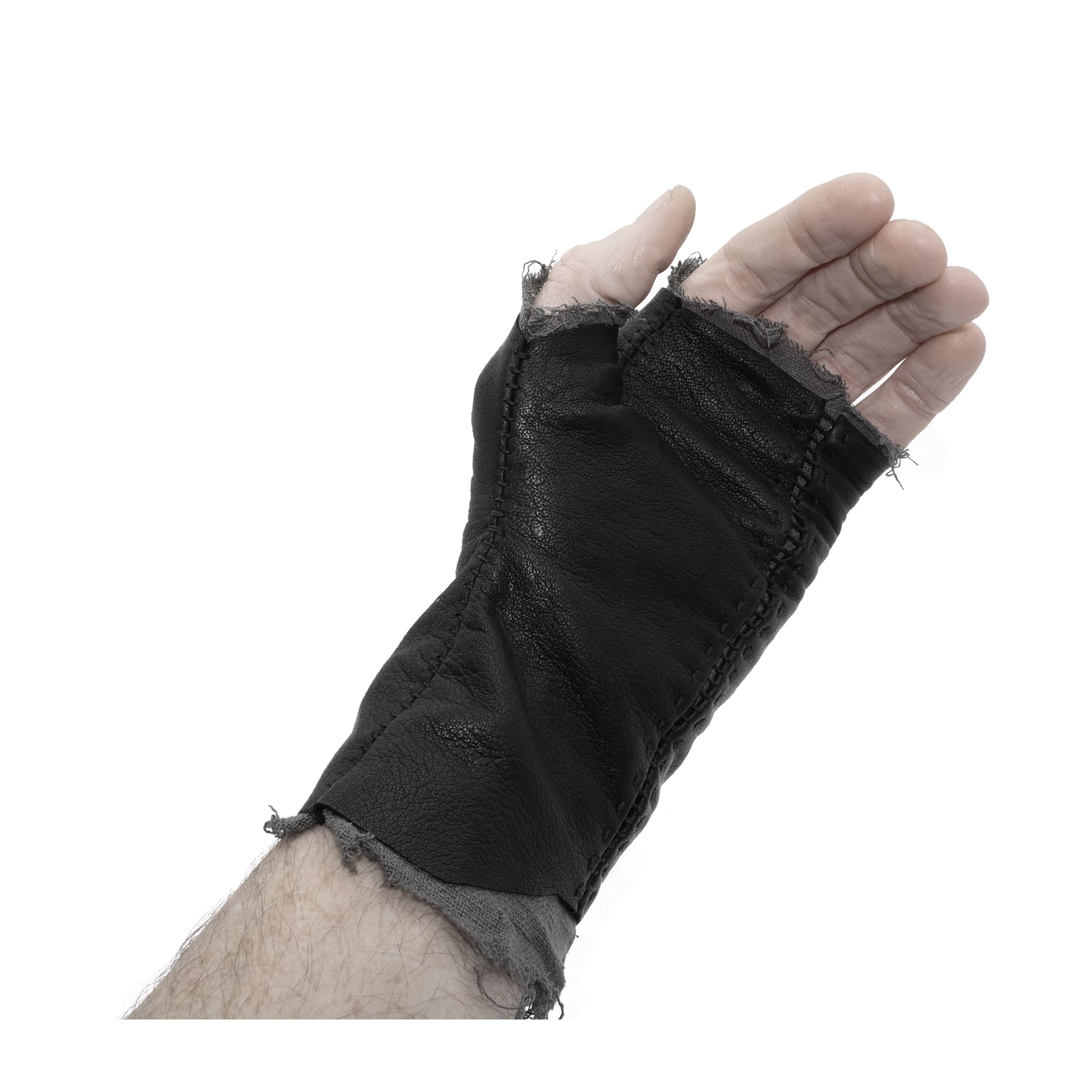 hand stitched over a 35hr period the washed kangaroo leather gloves feature deconstructed open seam panels, and an object dyed raw silk floating lining. the gloves are available to buy online from avant garde leather studio atelierskn.com
