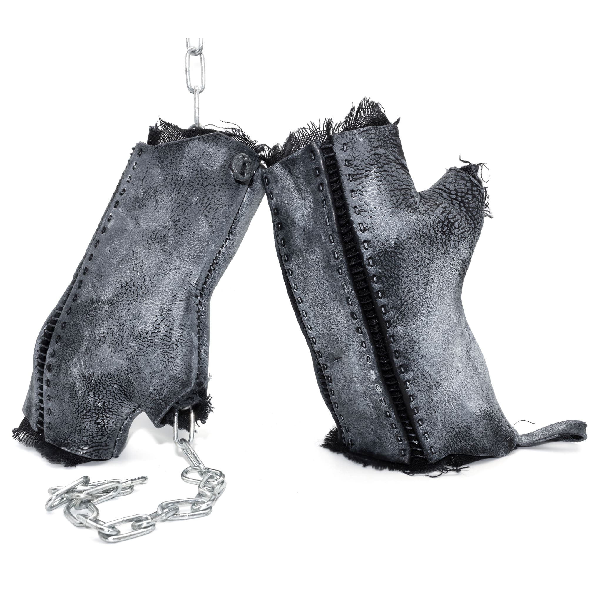 hand stitched over a 35hr period the washed cordovan gloves feature deconstructed open seam panels, hand forged solid .999 sterling silver button and a stone washed ramie lining. the gloves are available to buy online from avant garde leather studio atelierskn.com