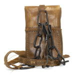 medium-sized transparent natural horse leather open seam cross body bag with a forged-iron chain link strap and zipper pocket on the back, completely handmade in the UK by atelier SKN