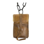 medium-sized transparent natural horse leather open seam cross body bag with a forged-iron chain link strap and zipper pocket on the back, completely handmade in the UK by atelier SKN