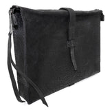hand stitched over a 50hr period the washed cordovan clutch bag features deconstructed side panels, hand forged iron hardware and a riri zipper closure adorned with solid .925 sterling silver zipper pulls. the bag is available to buy online from avant garde leather studio atelierskn.com