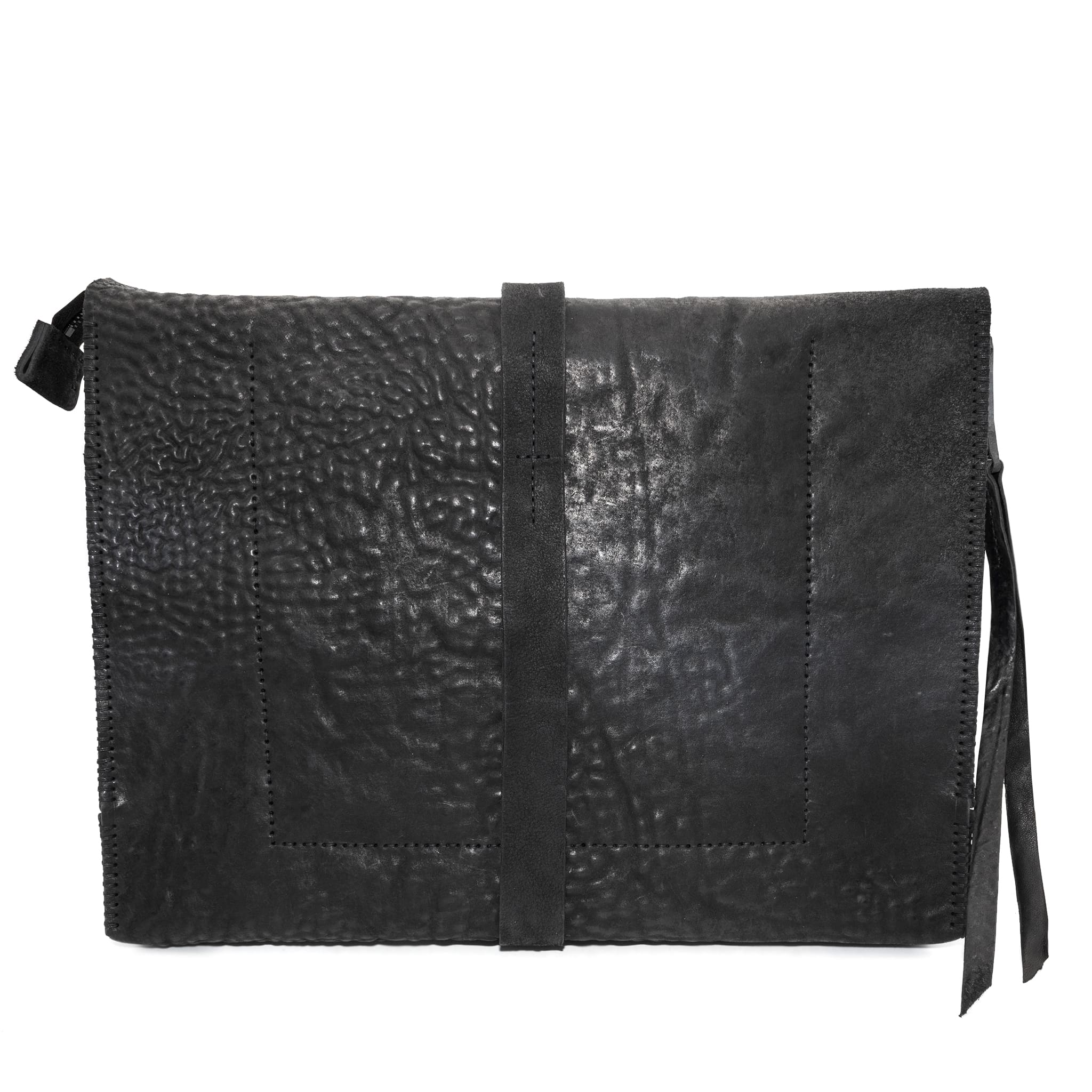 hand stitched over a 50hr period the washed cordovan clutch bag features deconstructed side panels, hand forged iron hardware and a riri zipper closure adorned with solid .925 sterling silver zipper pulls. the bag is available to buy online from avant garde leather studio atelierskn.com