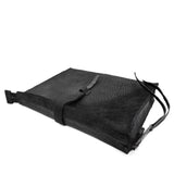 hand stitched over a 50hr period the washed cordovan clutch bag features deconstructed side panels, hand forged iron hardware and a riri zipper closure adorned with solid .925 sterling silver zipper pulls. the bag is available to buy online from avant garde leather studio atelierskn.com