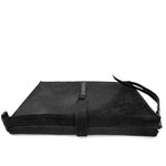 hand stitched over a 50hr period the washed cordovan clutch bag features deconstructed side panels, hand forged iron hardware and a riri zipper closure adorned with solid .925 sterling silver zipper pulls. the bag is available to buy online from avant garde leather studio atelierskn.com