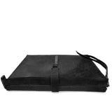 hand stitched over a 50hr period the washed cordovan clutch bag features deconstructed side panels, hand forged iron hardware and a riri zipper closure adorned with solid .925 sterling silver zipper pulls. the bag is available to buy online from avant garde leather studio atelierskn.com