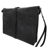 hand stitched over a 50hr period the washed cordovan clutch bag features deconstructed side panels, hand forged iron hardware and a riri zipper closure adorned with solid .925 sterling silver zipper pulls. the bag is available to buy online from avant garde leather studio atelierskn.com