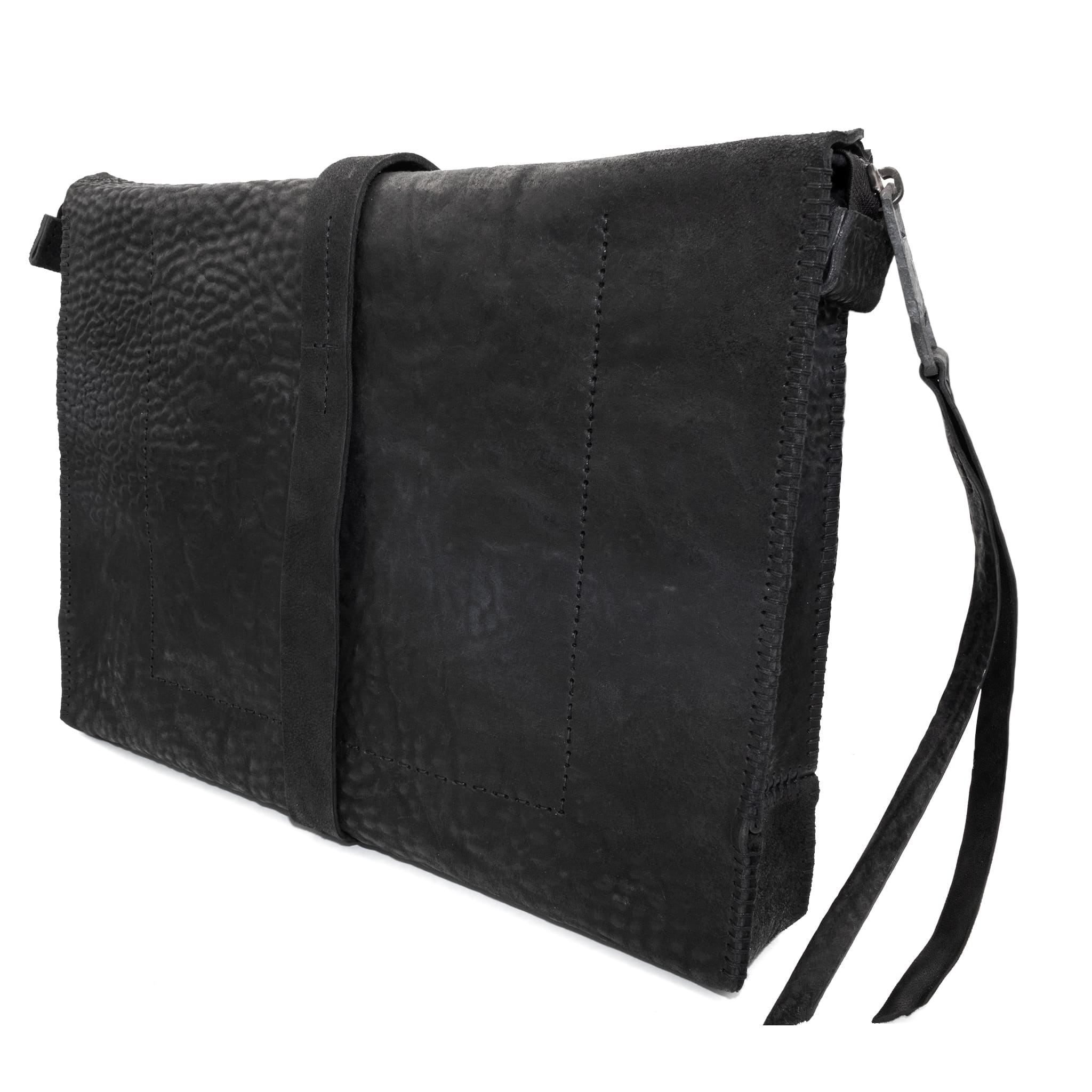 hand stitched over a 50hr period the washed cordovan clutch bag features deconstructed side panels, hand forged iron hardware and a riri zipper closure adorned with solid .925 sterling silver zipper pulls. the bag is available to buy online from avant garde leather studio atelierskn.com