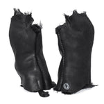 hand stitched over a 35hr period the washed cordovan gloves feature deconstructed open seam panels, hand forged solid .999 sterling silver button and a raw cut stone washed ramie lining. the gloves are available to buy online from avant garde leather studio atelierskn.com 