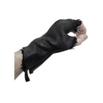 hand stitched over a 35hr period the washed cordovan gloves feature deconstructed open seam panels, hand forged solid .999 sterling silver button and a raw cut stone washed ramie lining. the gloves are available to buy online from avant garde leather studio atelierskn.com 