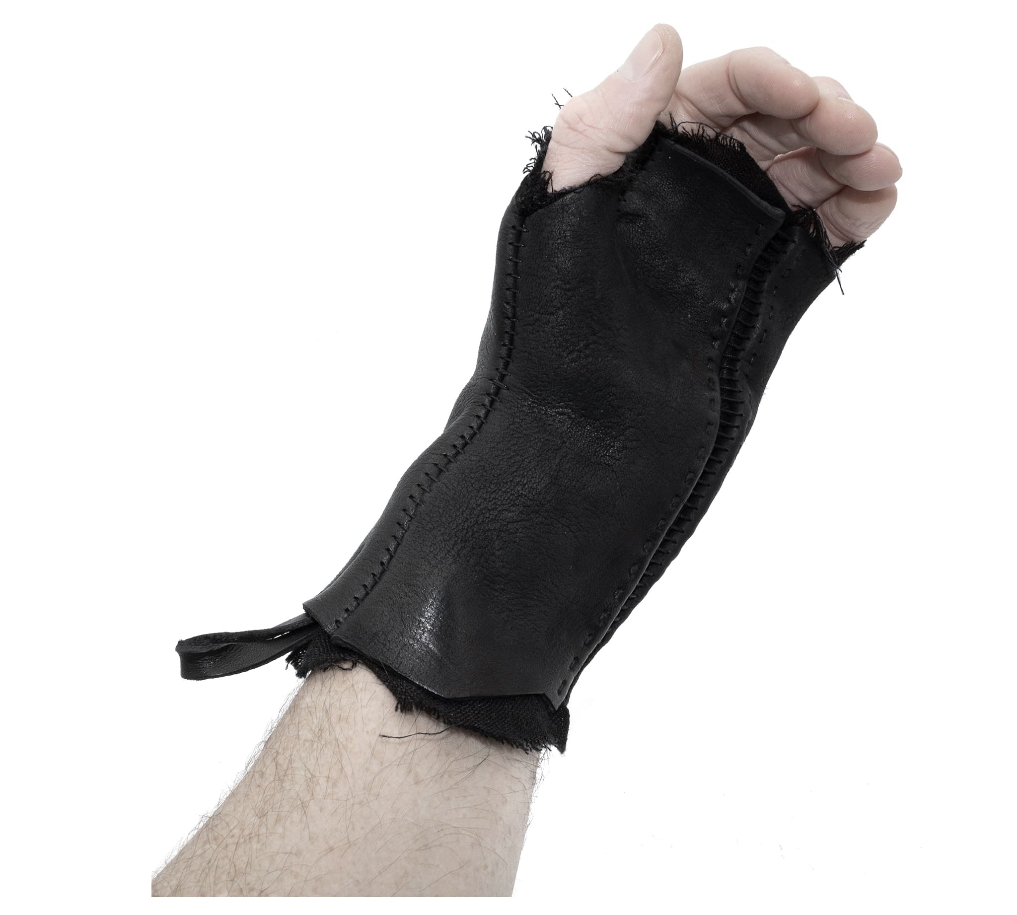 hand stitched over a 35hr period the washed cordovan gloves feature deconstructed open seam panels, hand forged solid .999 sterling silver button and a raw cut stone washed ramie lining. the gloves are available to buy online from avant garde leather studio atelierskn.com 