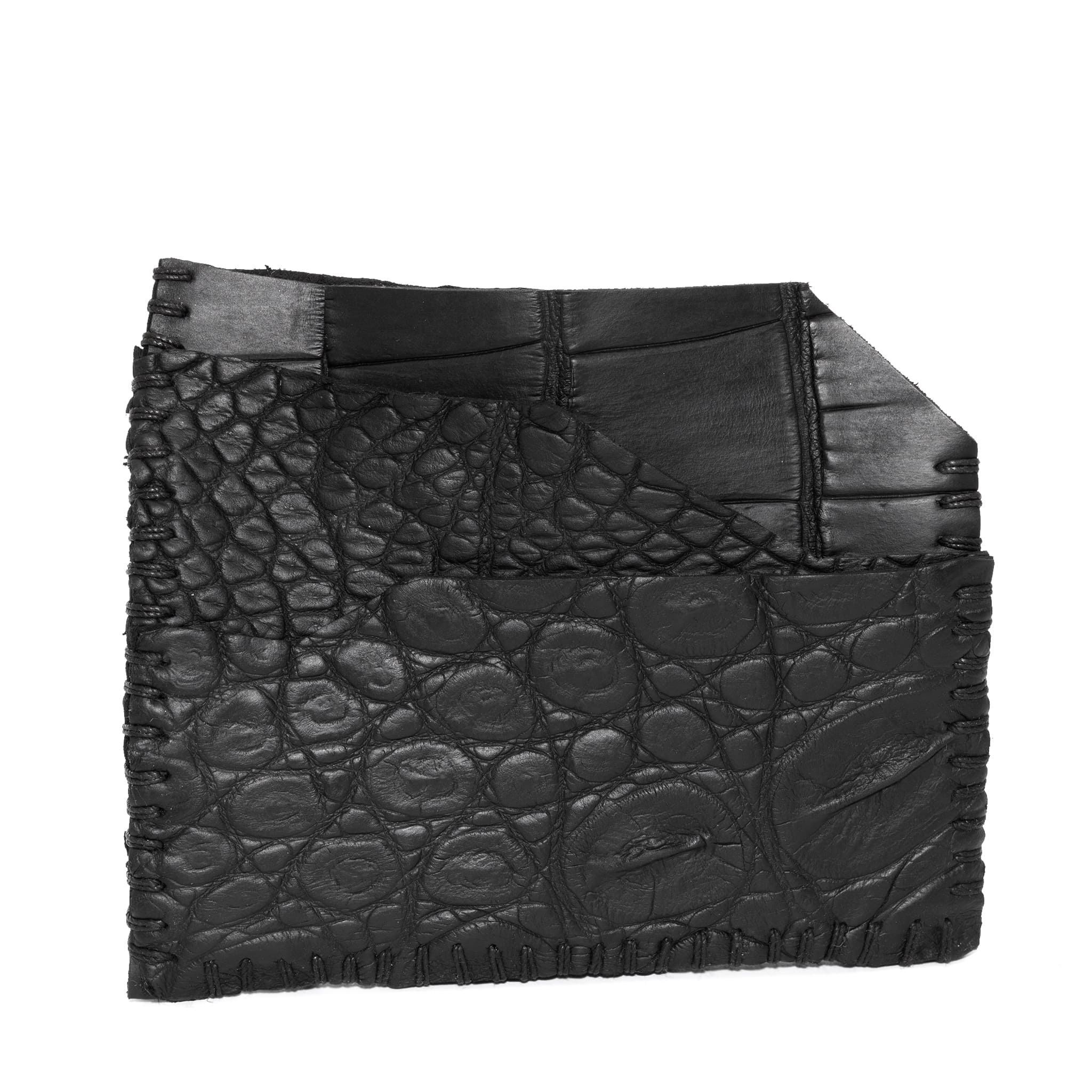hand stitched over an 8 hour period the genuine crocodile cardholder features multiple card slots, hand stitched overlock sides and an array of unique textures. the cardholder is available to buy online from avant garde leather studio atelierskn.com