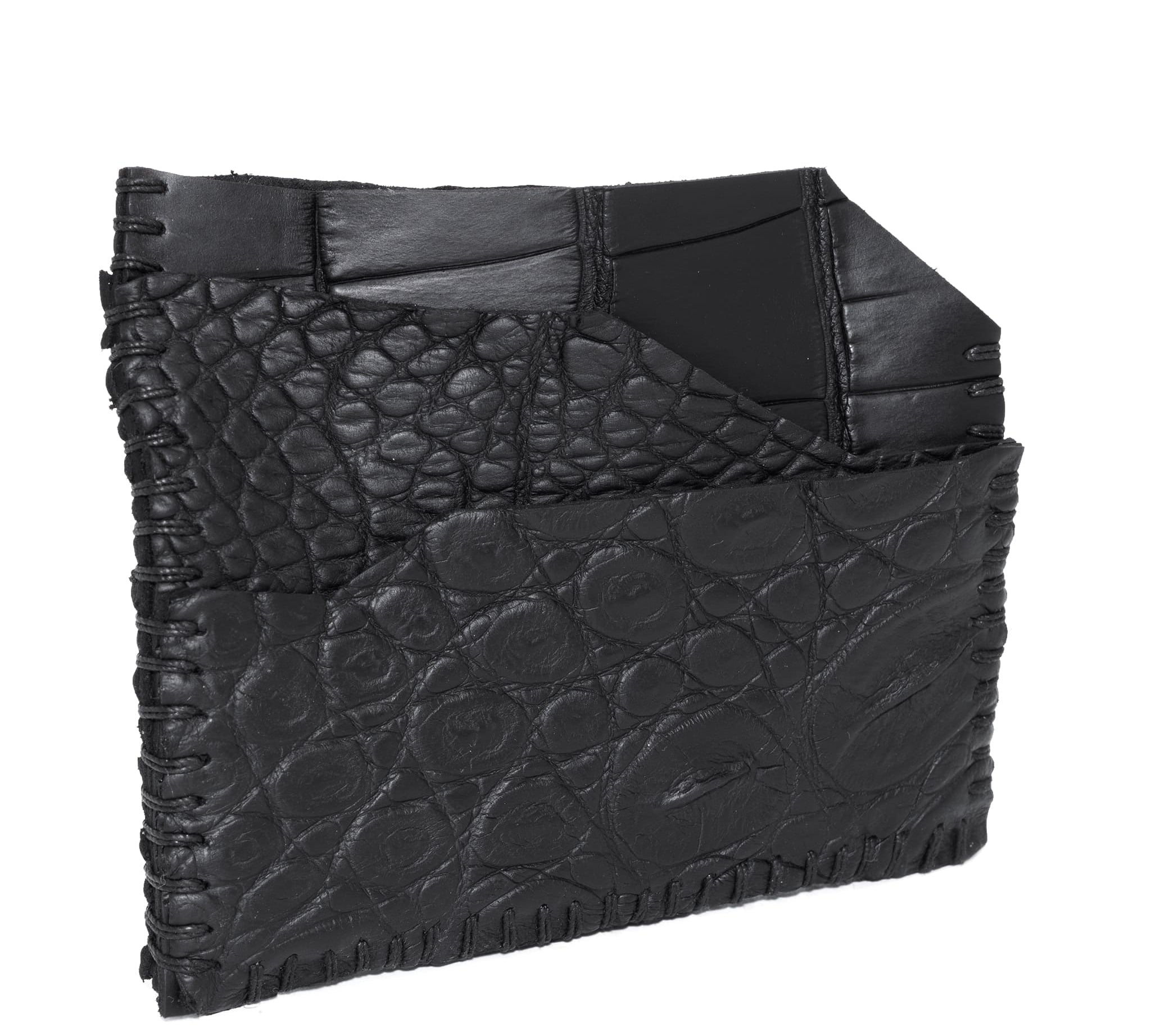 hand stitched over an 8 hour period the genuine crocodile cardholder features multiple card slots, hand stitched overlock sides and an array of unique textures. the cardholder is available to buy online from avant garde leather studio atelierskn.com