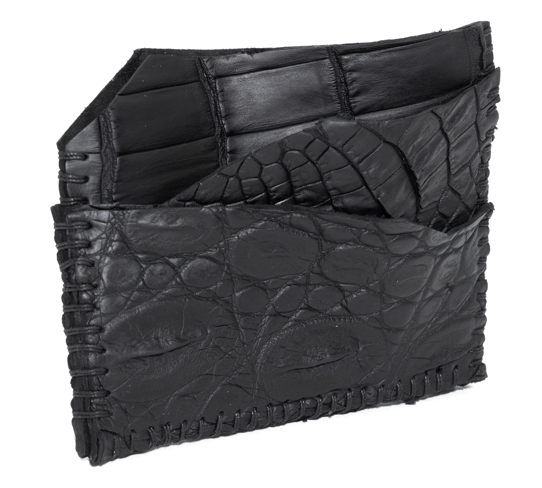 hand stitched over an 8 hour period the genuine crocodile cardholder features multiple card slots, hand stitched overlock sides and an array of unique textures. the cardholder is available to buy online from avant garde leather studio atelierskn.com