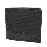 a closed seam 8 pocket bifold wallet crafted from a butter soft reverse culatta leather with a matte black object dyed finish. a riri zipper pocket is adorned with a hand forged solid .925sterling silver zipper pull available to buy online from artisanal leather studio atelierskn.com