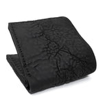 a closed seam 8 pocket bifold wallet crafted from a butter soft reverse culatta leather with a matte black object dyed finish. a riri zipper pocket is adorned with a hand forged solid .925sterling silver zipper pull available to buy online from artisanal leather studio atelierskn.com