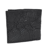 a closed seam 8 pocket bifold wallet crafted from a butter soft reverse culatta leather with a matte black object dyed finish. a riri zipper pocket is adorned with a hand forged solid .925sterling silver zipper pull available to buy online from artisanal leather studio atelierskn.com