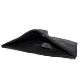 a closed seam 8 pocket bifold wallet crafted from a butter soft reverse culatta leather with a matte black object dyed finish. a riri zipper pocket is adorned with a hand forged solid .925sterling silver zipper pull available to buy online from artisanal leather studio atelierskn.com