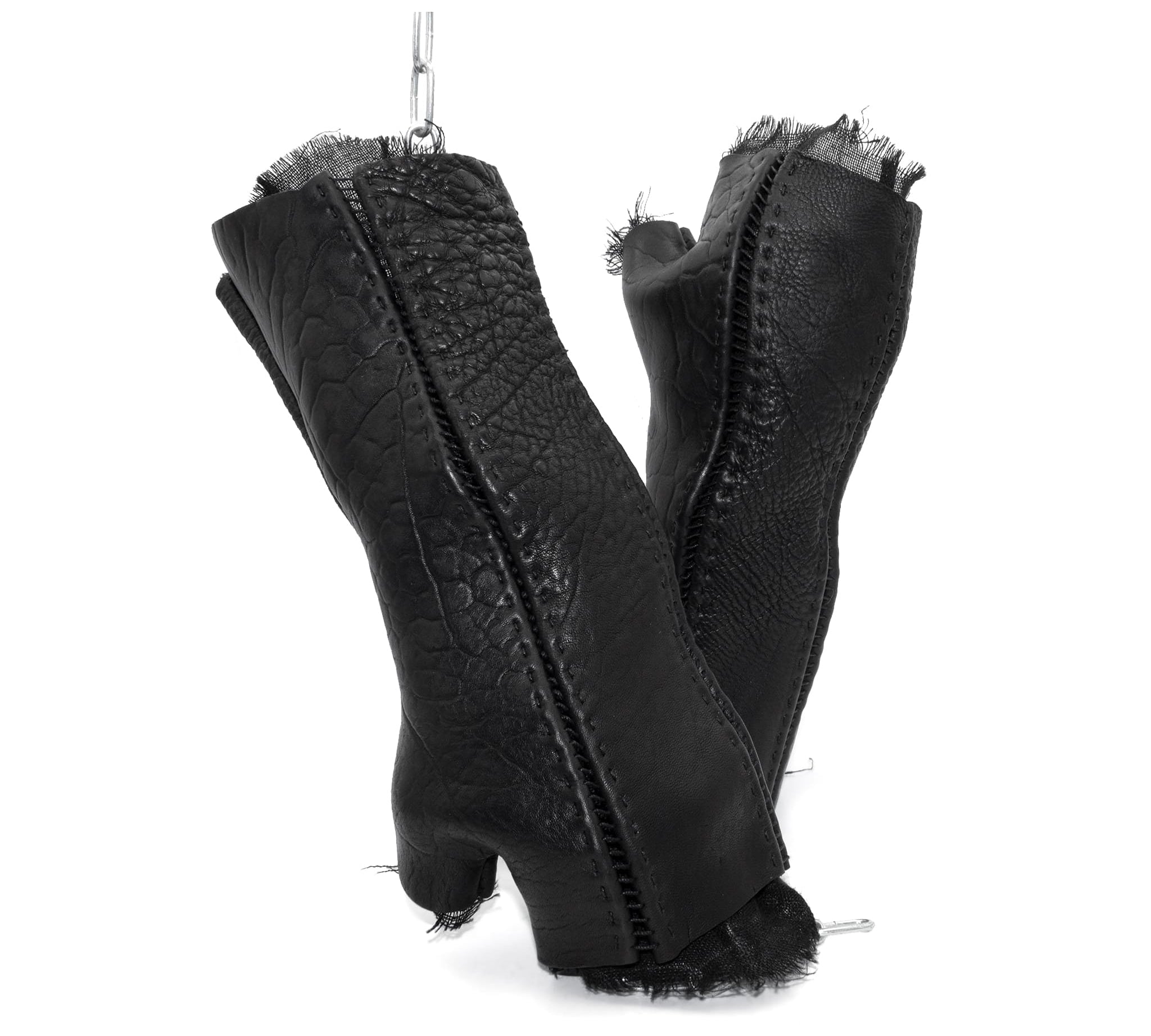 hand stitched over a 40hr period the washed culatta leather gloves feature deconstructed open seam panels, and a stone washed ramie lining. wet moulded on the body over an 8 hour period for a sculptured aesthetic. the gloves are available to buy online from avant garde leather studio atelierskn.com
