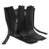 a matte black full grain horse culatta leather collar, meticulously hand stitched with an open seam construction. the scarf features a stonewashed ramie lining and riri zipper closures adorned with hand forged .925 sterling silver zipper pulls. available to buy online from avant garde leather studio atelierskn.com