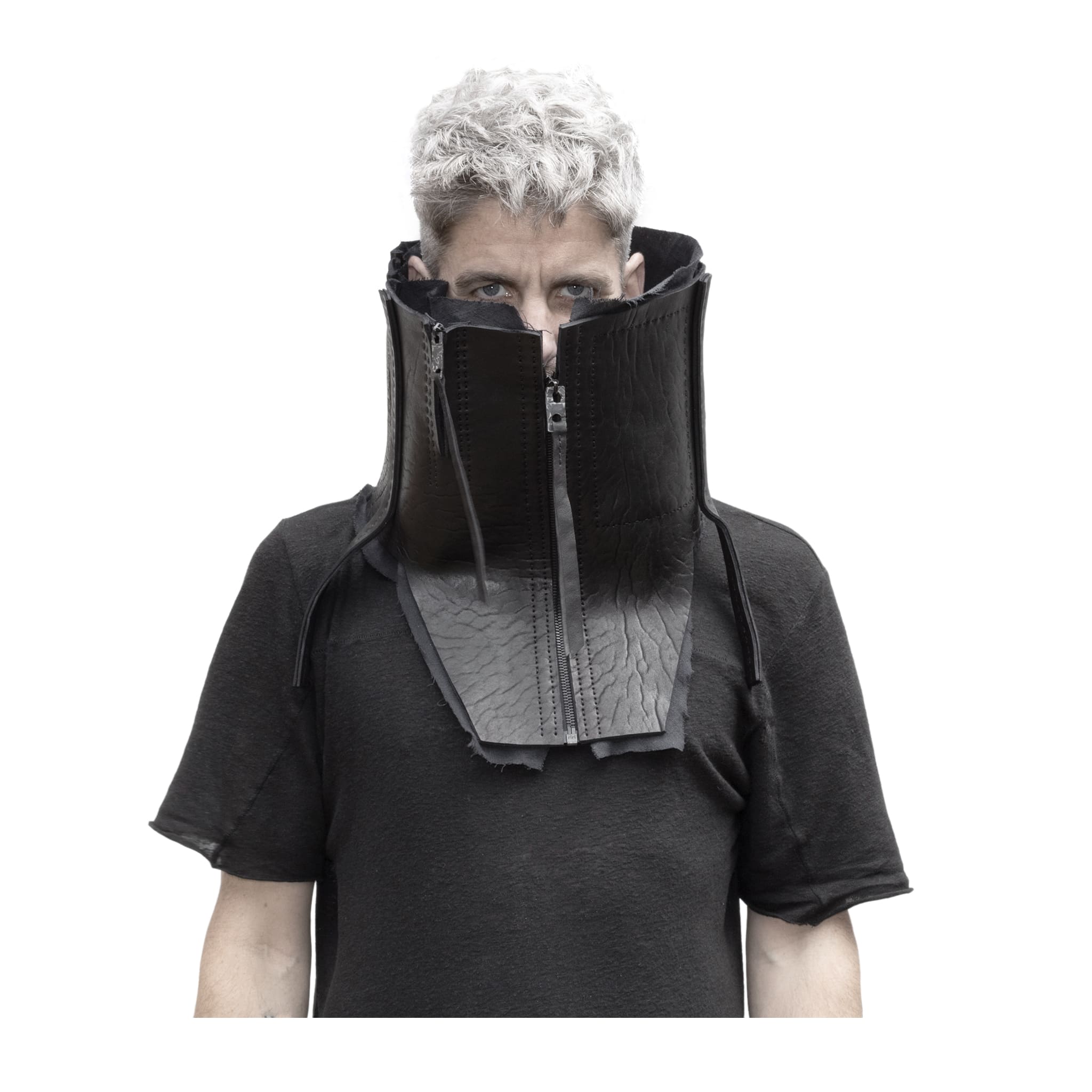 a matte black full grain horse culatta leather collar, meticulously hand stitched with an open seam construction. the scarf features a stonewashed ramie lining and riri zipper closures adorned with hand forged .925 sterling silver zipper pulls. available to buy online from avant garde leather studio atelierskn.com