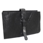 compact matte black horse leather wallet with a forged-iron shank closure and a zipper coin pocket, completely handmade in the UK by atelier SKN