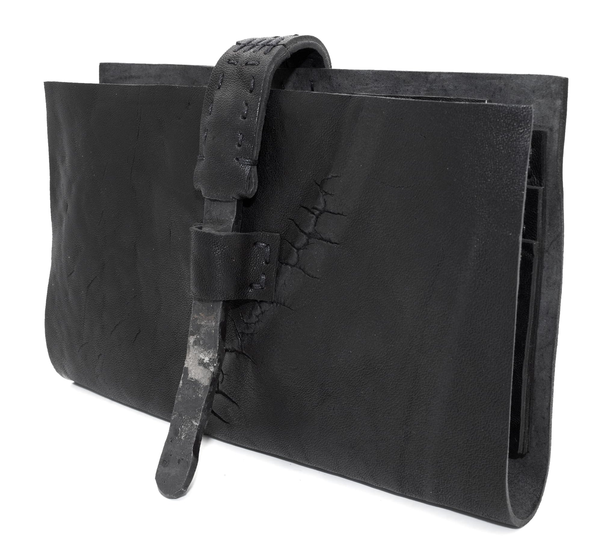 compact matte black horse leather wallet with a forged-iron shank closure and a zipper coin pocket, completely handmade in the UK by atelier SKN