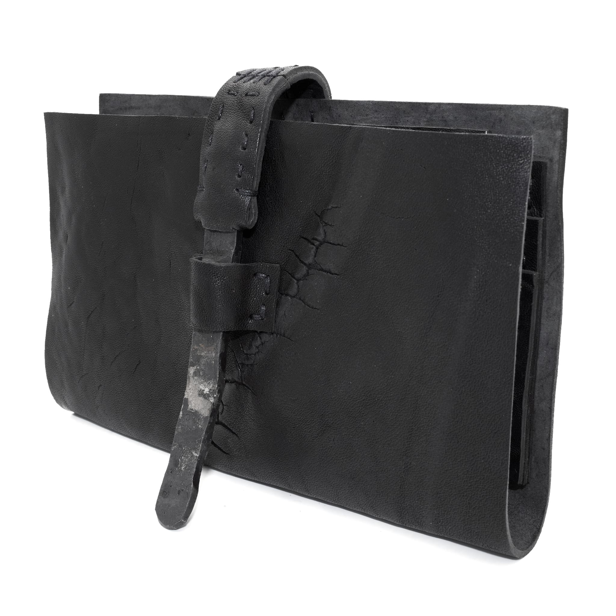 compact matte black horse leather wallet with a forged-iron shank closure and a zipper coin pocket, completely handmade in the UK by atelier SKN